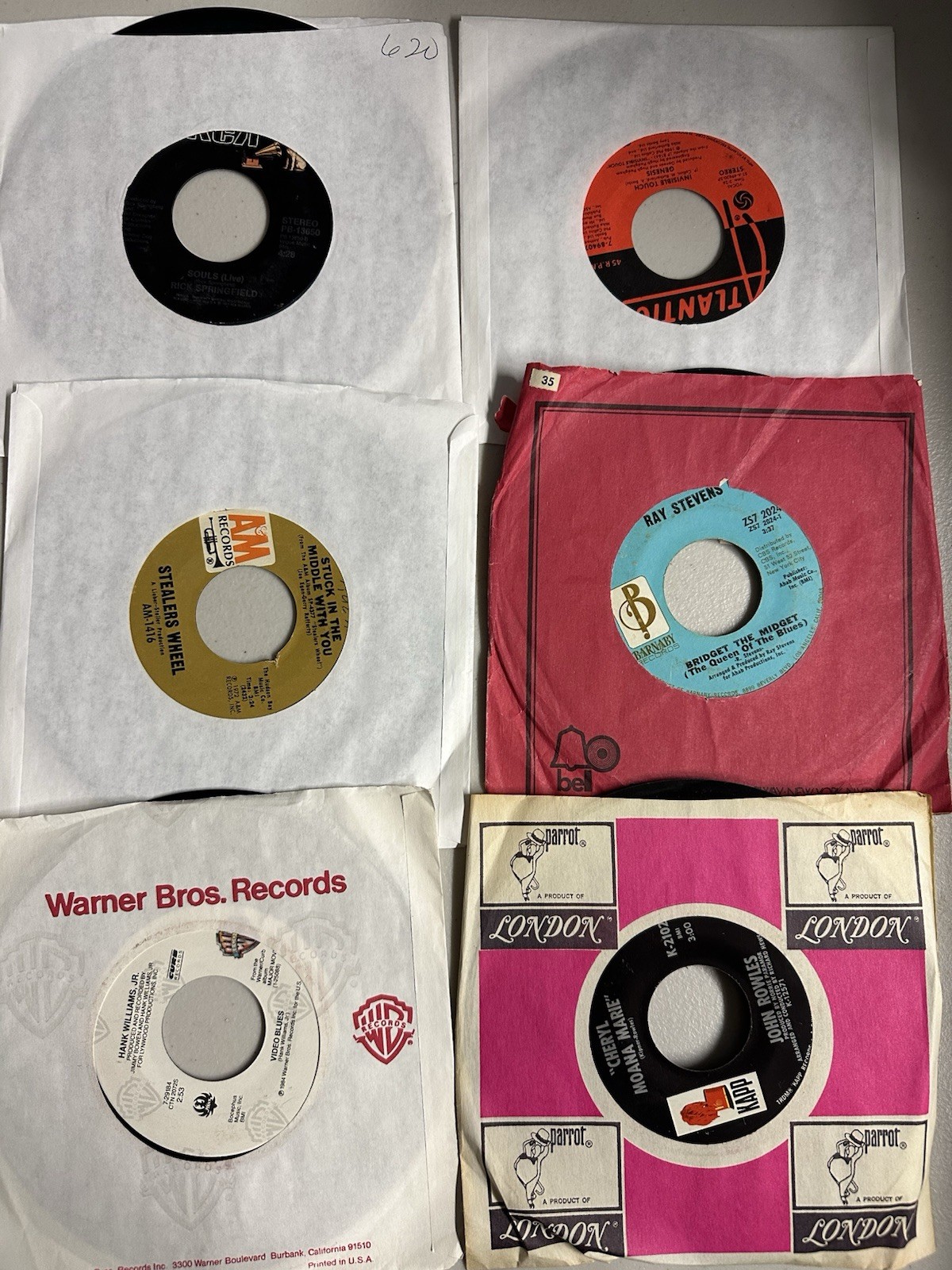 100 Random 7’ Records
