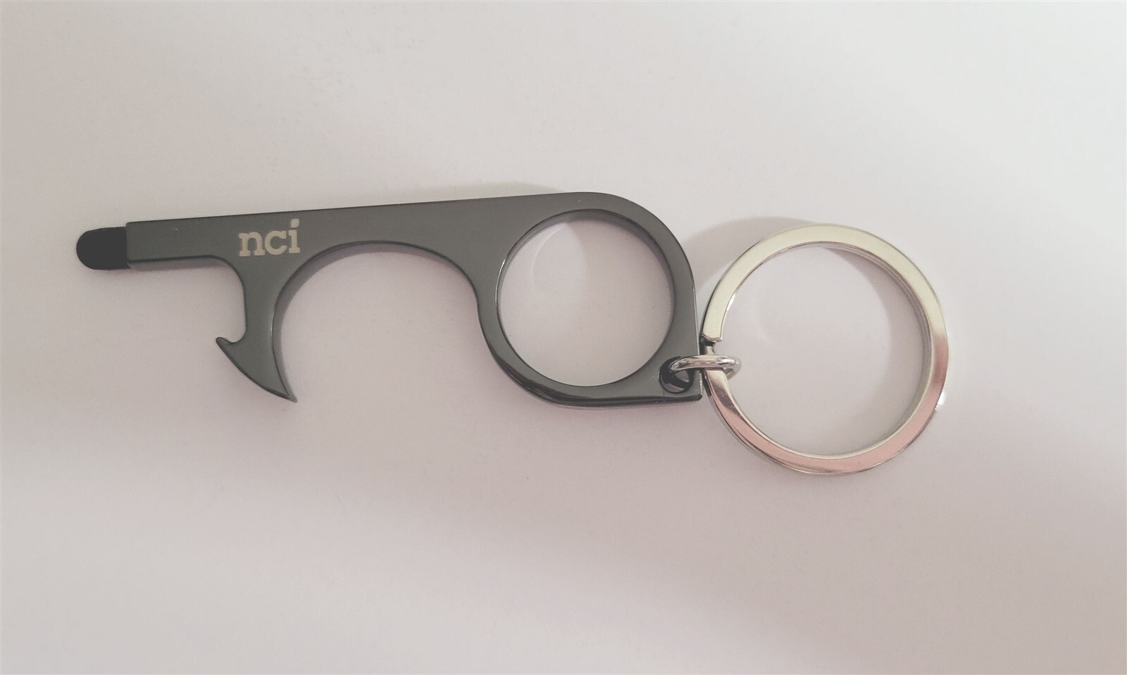 NCI North Central Institute Keychain Bottle Opener Military