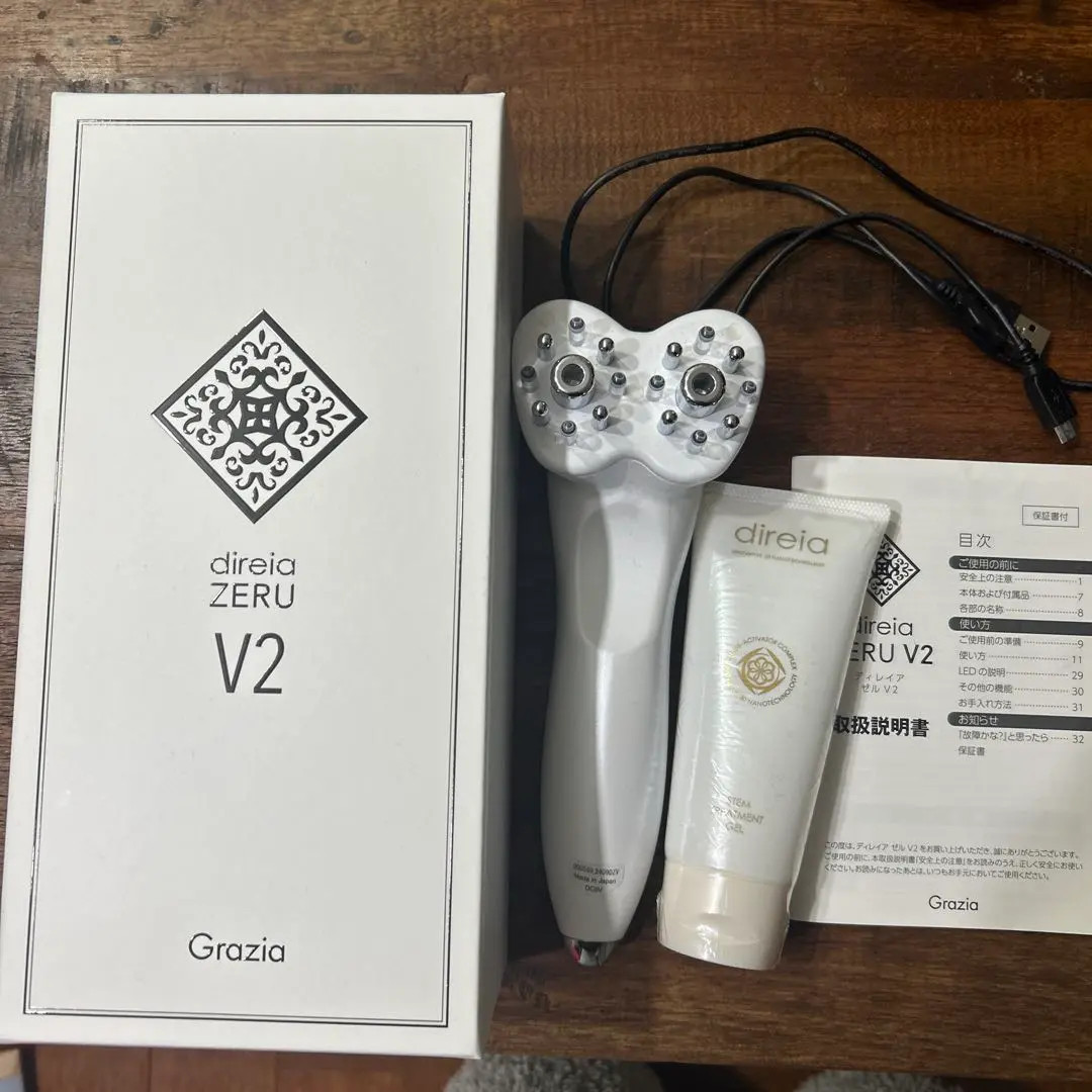 Direia ZERU V2 Face Body Beauty Device EMS Massager Used Tested Japan w/ Unused