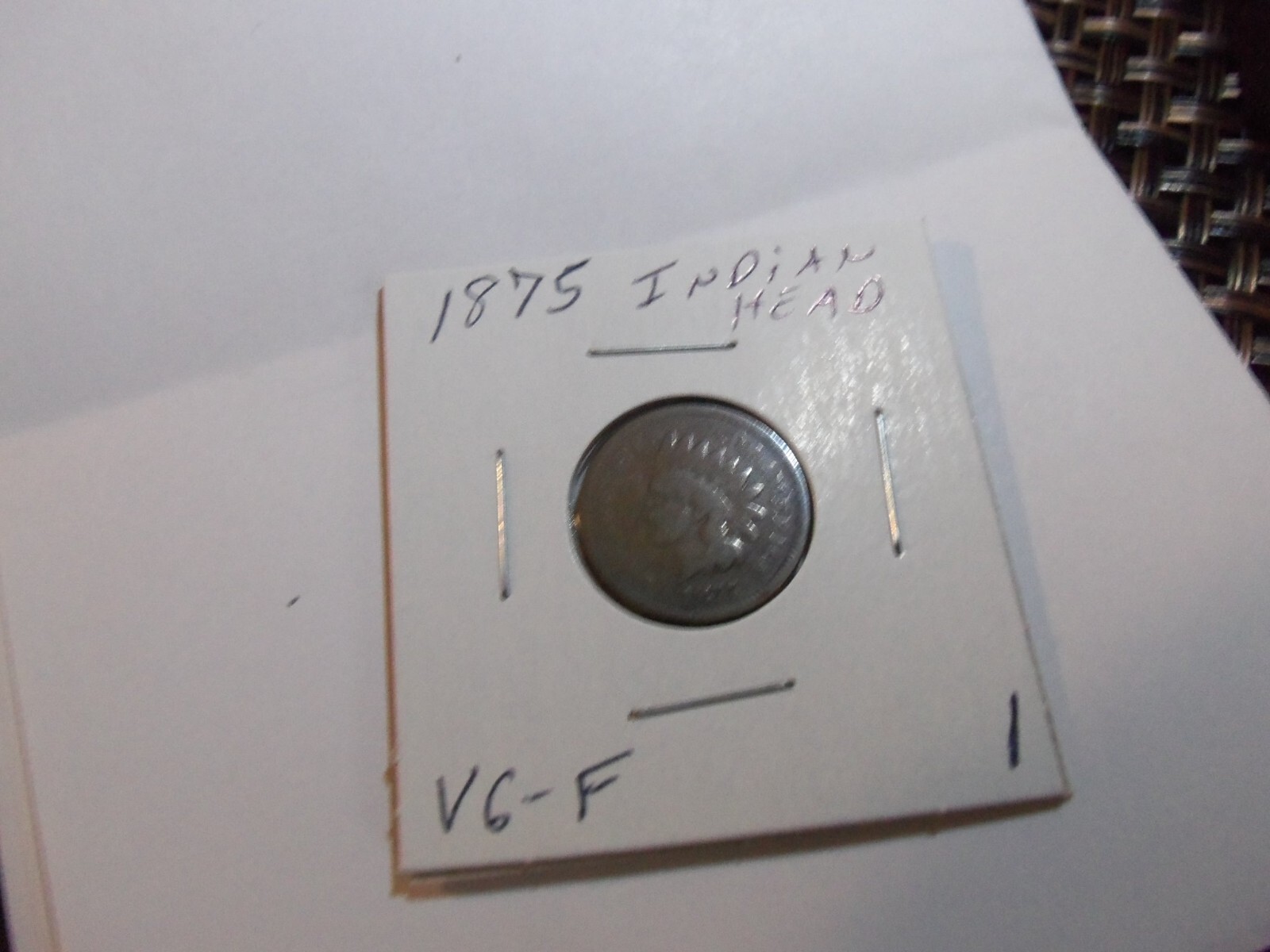 A KEY 1875 INDIAN HEAD PENNY