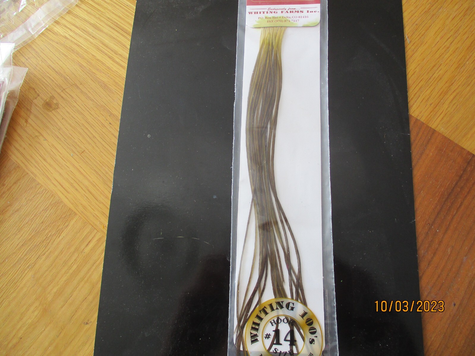 whitings 100s saddle hackle olive size 14s enough to tye 100