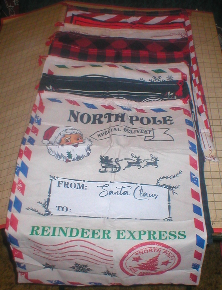 CHRISTMAS DRAWSTRING SACKS 19" X 27" FABRIC LOT OF 8 SOLD AS IS