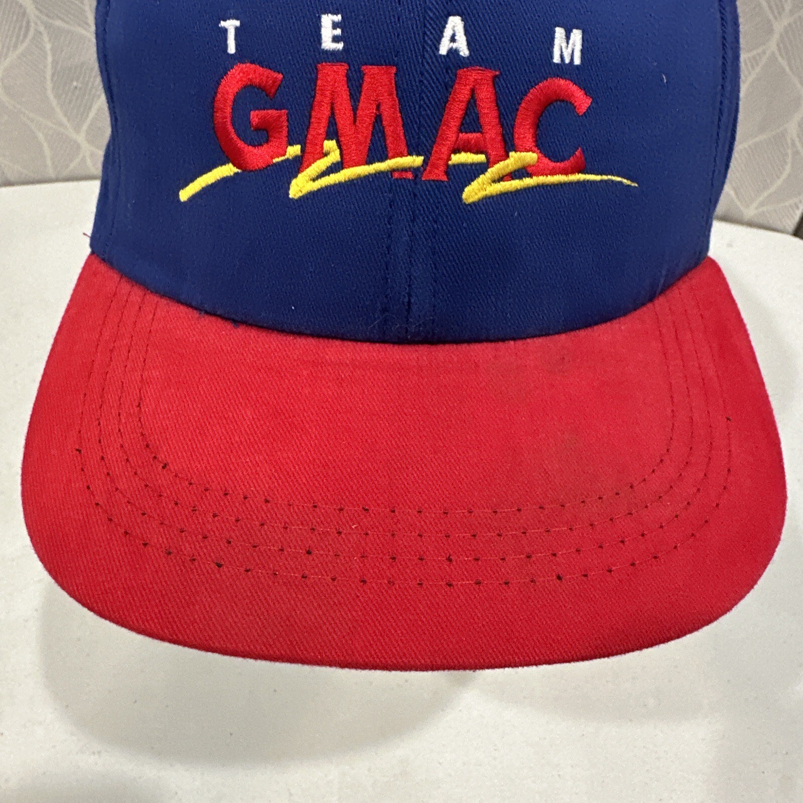Team GMAC 50 5 24 Blue and Red Snap-Back Strap Hat by Morris Design