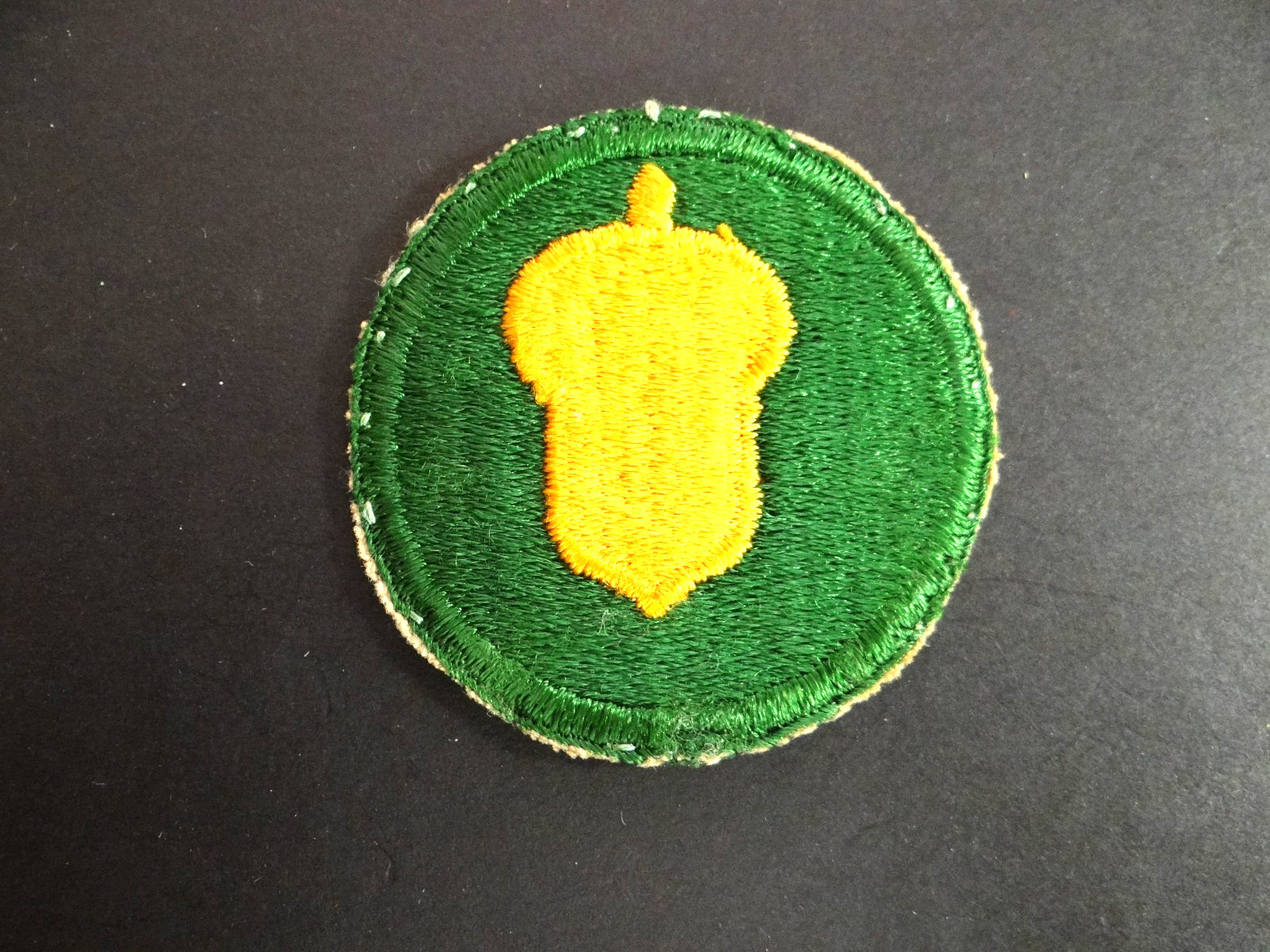 Original WWII US Army 87th Infantry Golden Acorn Division patch.