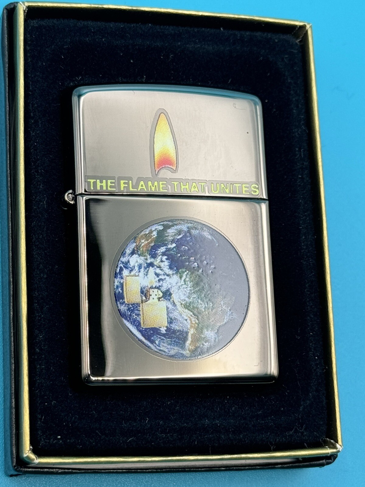 Vintage 2004 The Flame That Unites Black Ice Zippo Lighter NEW
