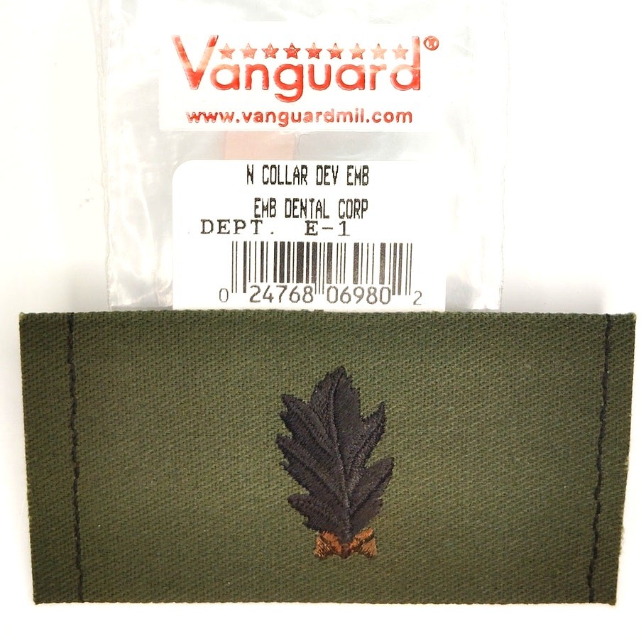 US Navy Dental Corps Subdued Collar Device Black on ODG Folded Twill 3.2 × 1.75"