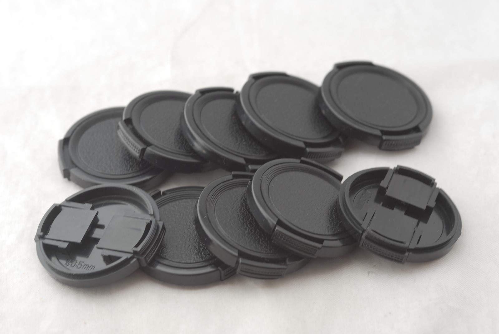 New 10 x 40.5mm Snap-on Lens Cap Set