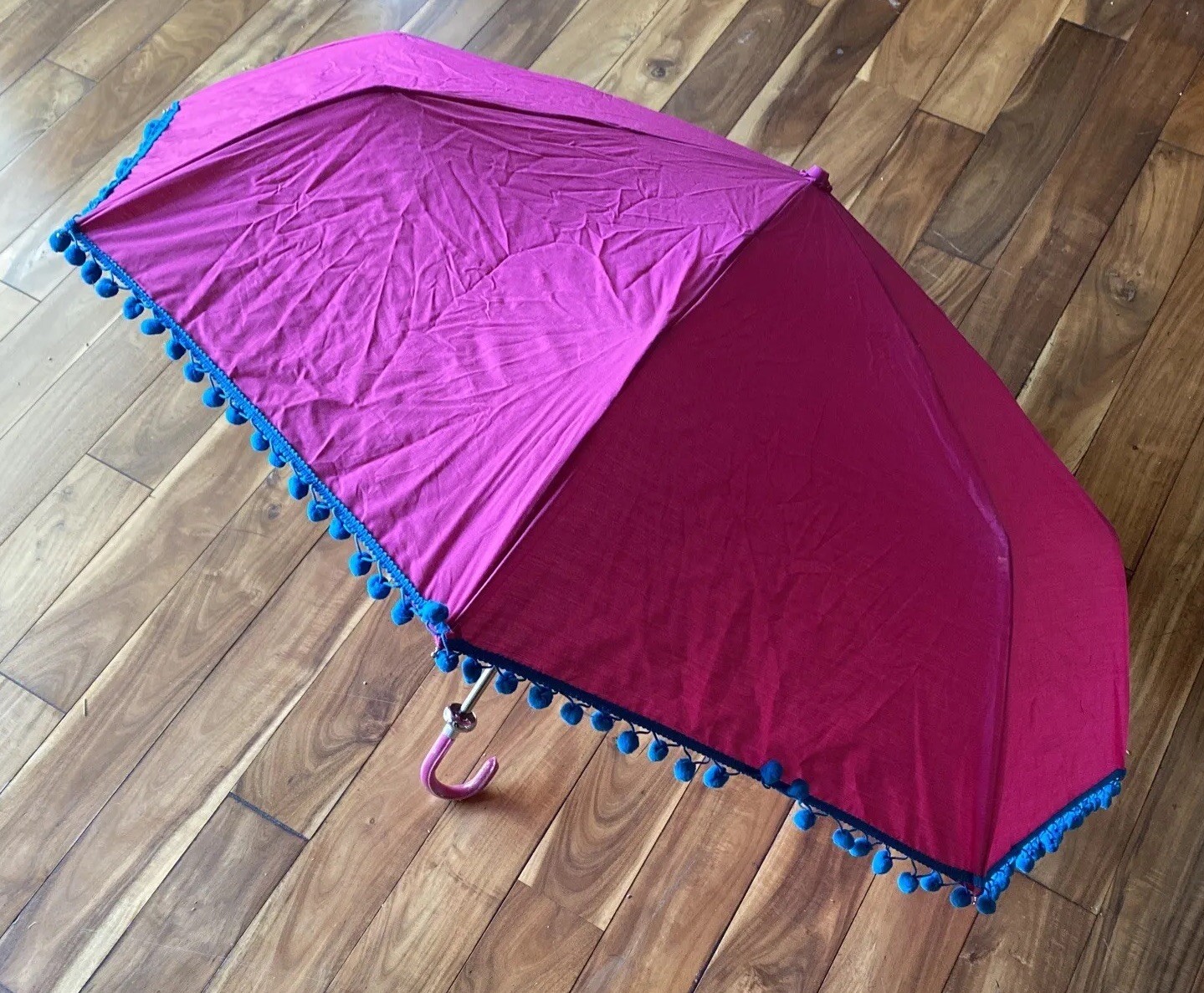 Bombay Duck Umbrella Retracting Fuchsia Pink with Pom Poms