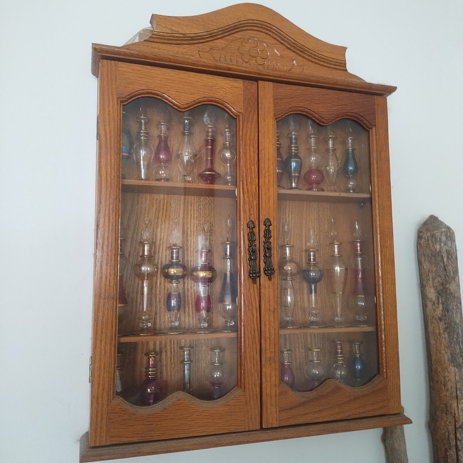 31 Teardrop Bottles, Glass Stoppers And Display Case, Various Colors