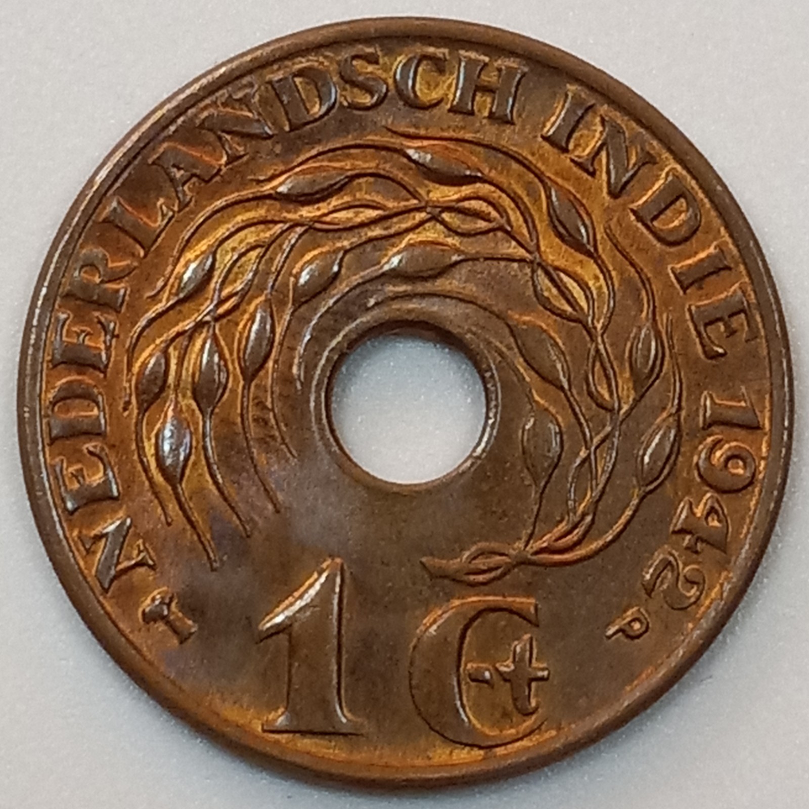 1942 Netherlands East Indies 1 Cent- About Uncirculated/Toned (Lot#2)