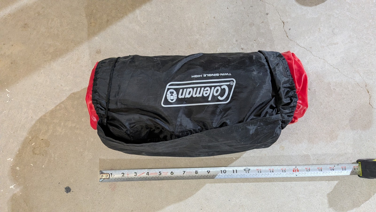Coleman twin single high with wrap m roll storage