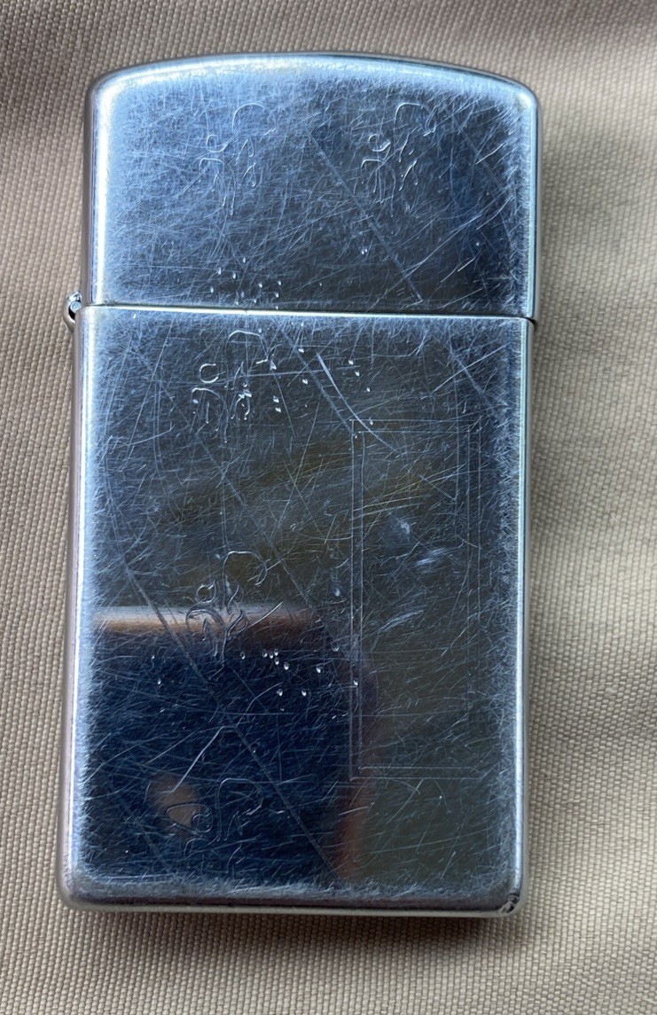 Vintage zippo slim lighter