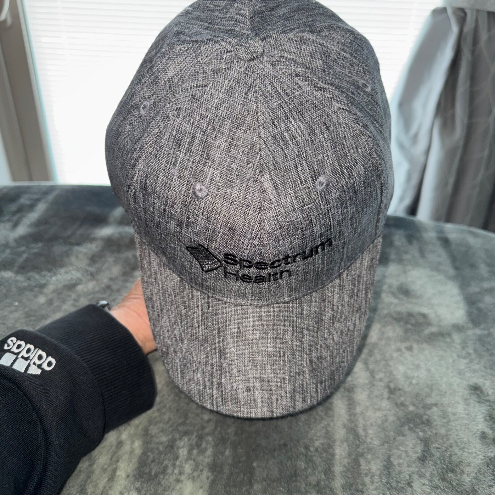 Spectrum Health in Black on Gray Linen Look Hat Cap Polyester EUC Hook Loop
