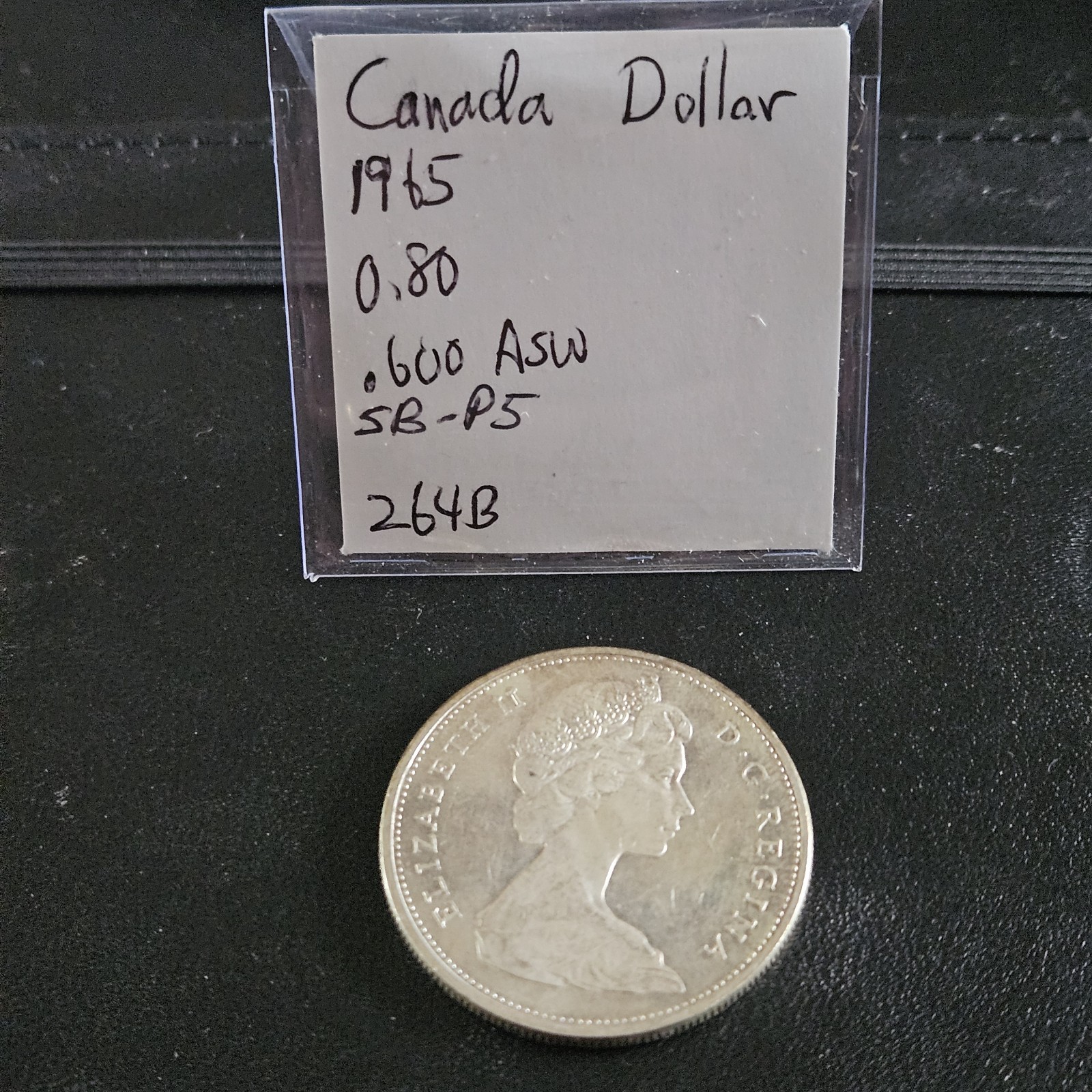 Two 1965 Canada Silver Dollars. 80%. Elizabeth II.     CANAP