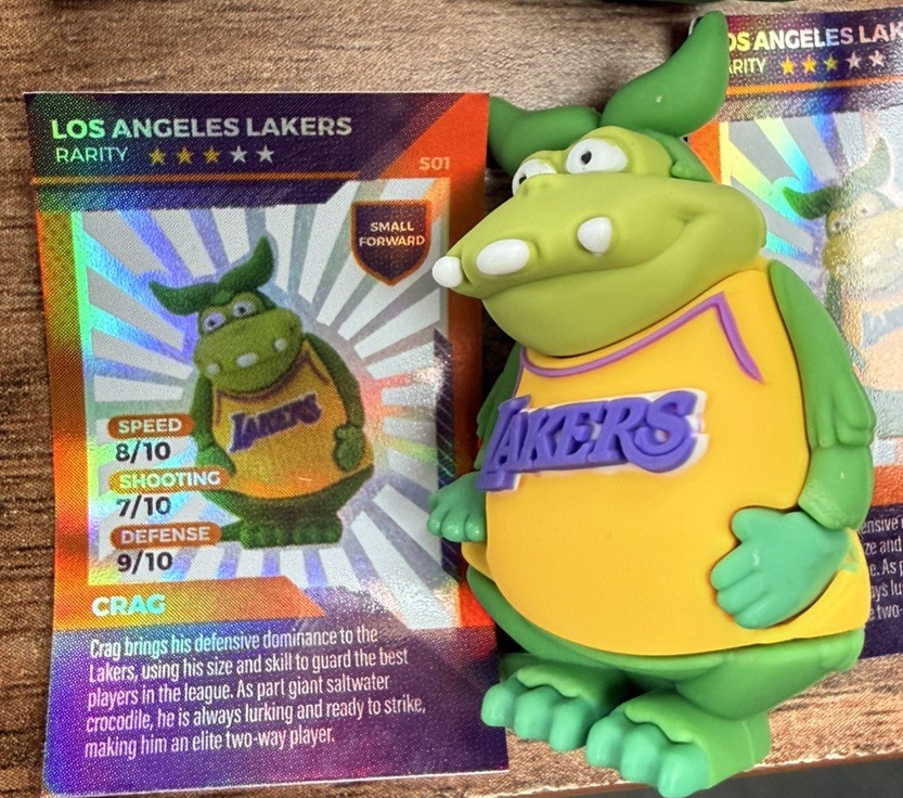 LA LAKERS  NBA BASKETBALL  YOWIE  PLASTIC  FIGURE, PAPER, and EGG