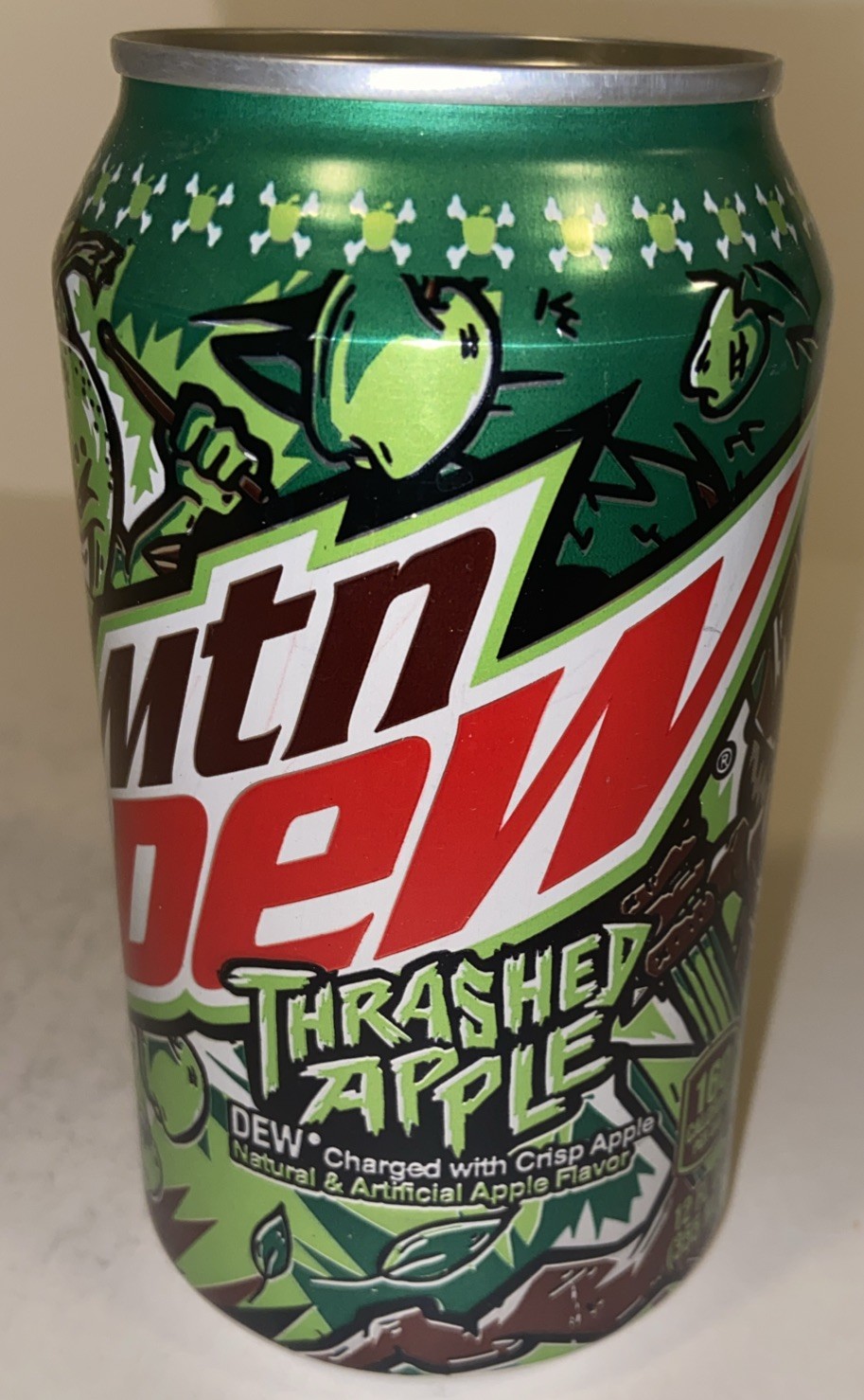 12oz. MTN DEW CAN ( THRASHED APPLE) EMPTY BOTTOM OPENED