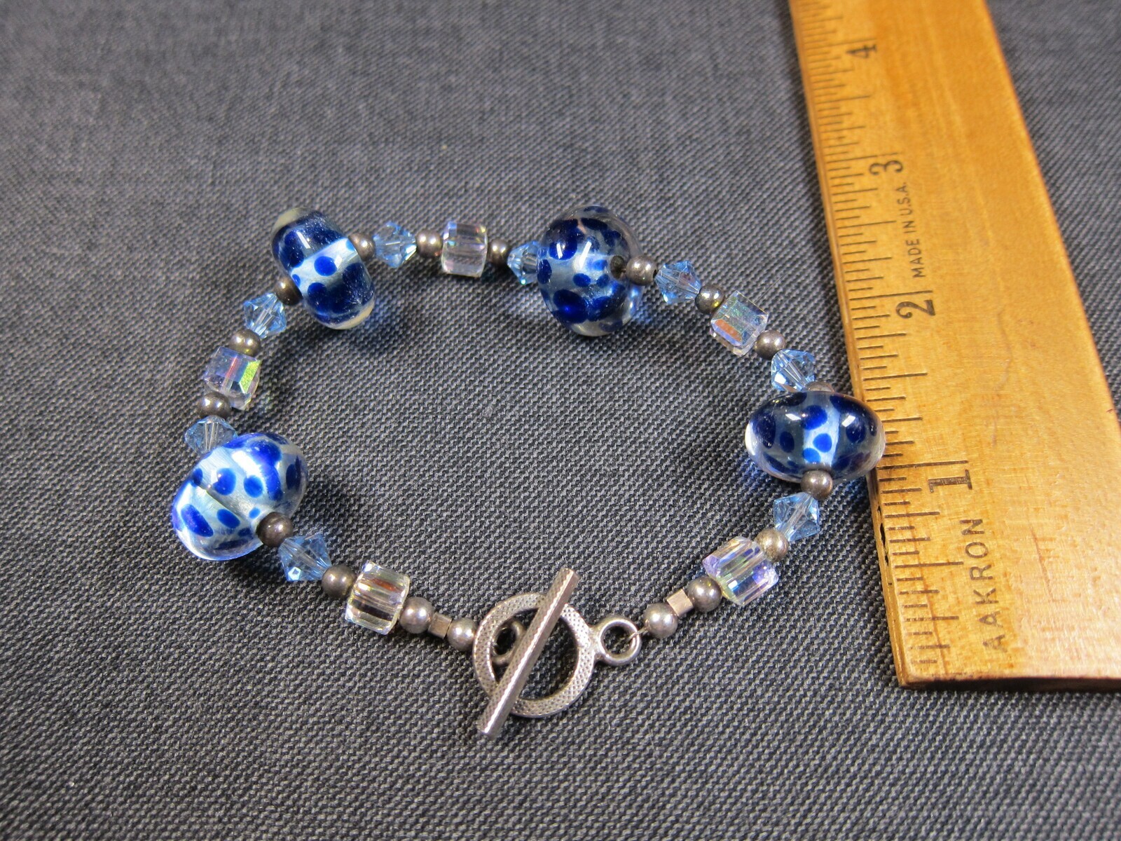 Beautiful hand-blown blue spotted glass beads & sterling toggle bracelet