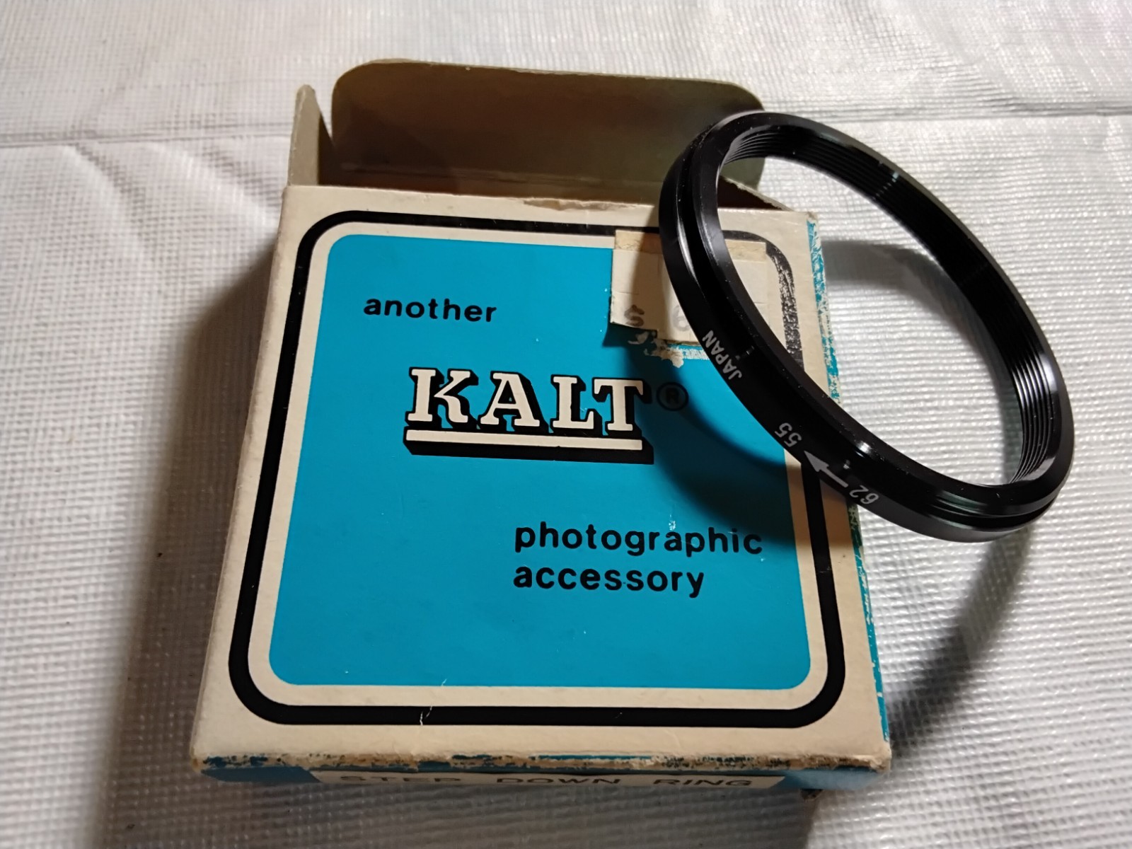 Kalt 62mm to 55mm step down ring. New old stock