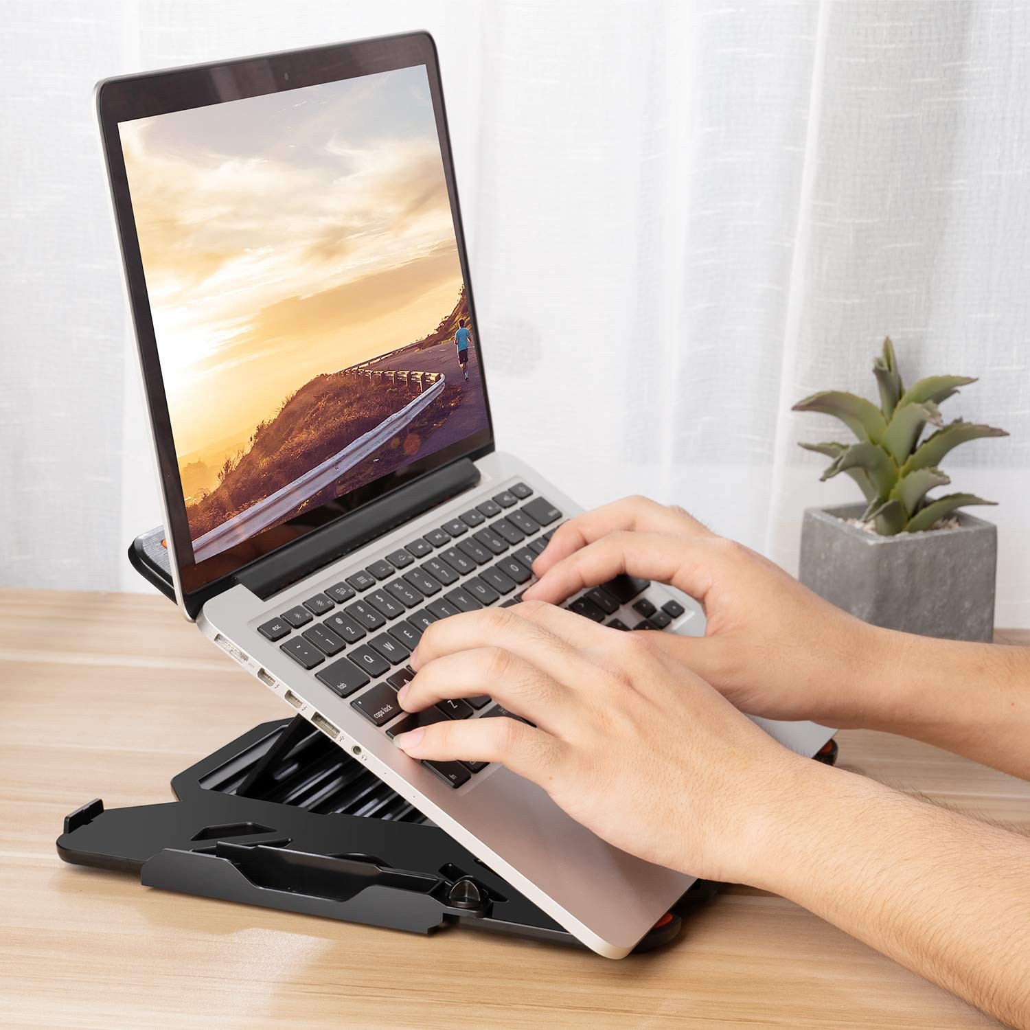 Adjustable Laptop Stand Foldable 360 Rotation Ventilated for 10-17in Laptops
