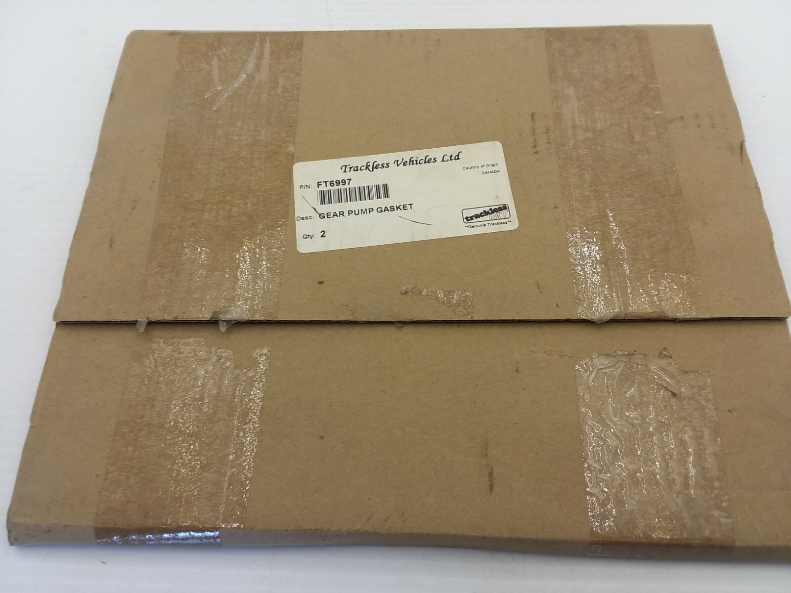 TRACKLESS VEHICLES LTD FT6997 GEAR PUMP GASKET NIB