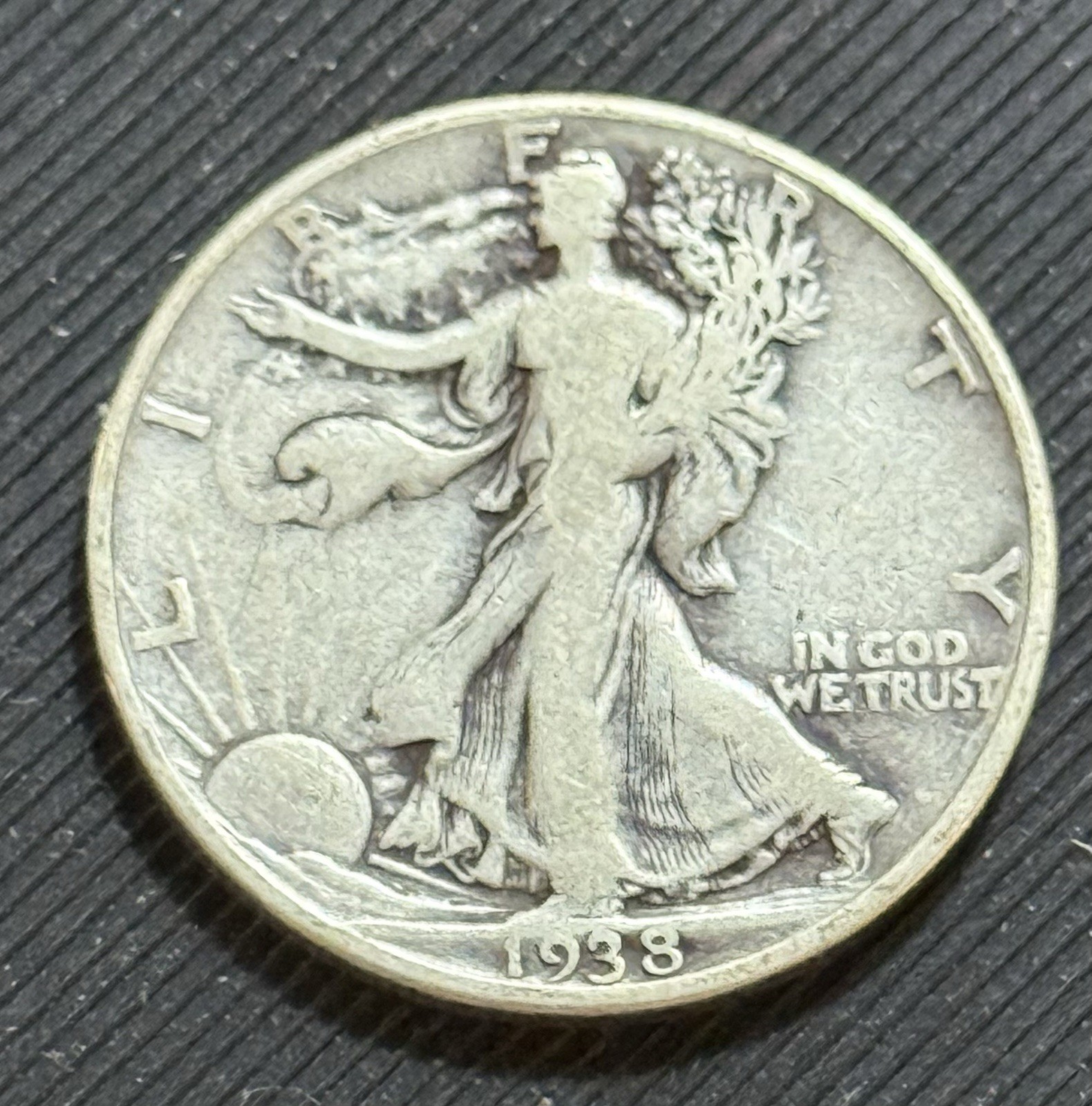 1938-D 50C Walking Liberty Half Dollar. VF condition
