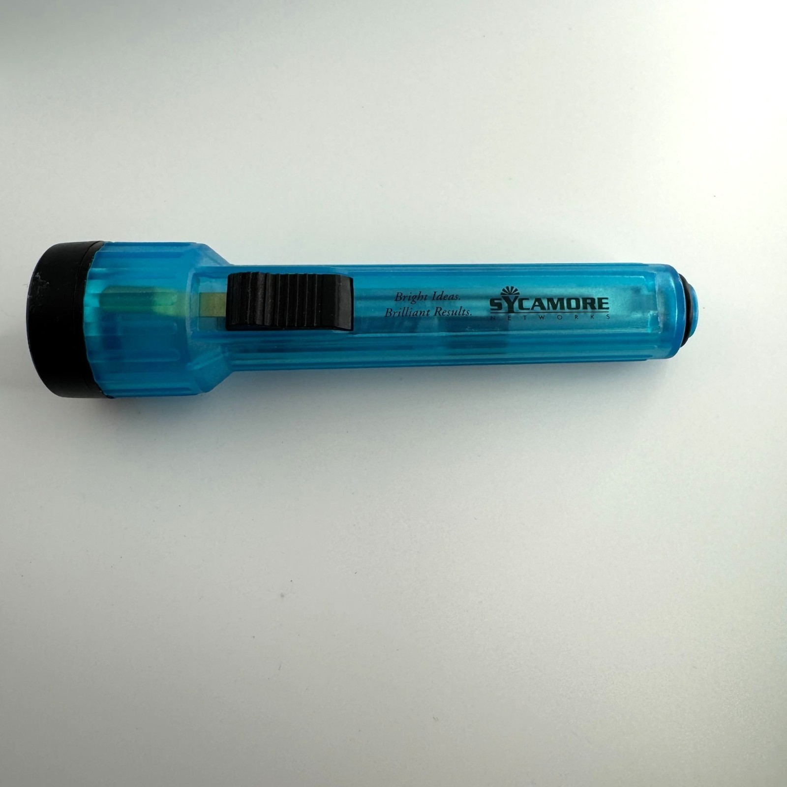 Sycamore Networks Blue Flashlight With Black Grip Slide Switch