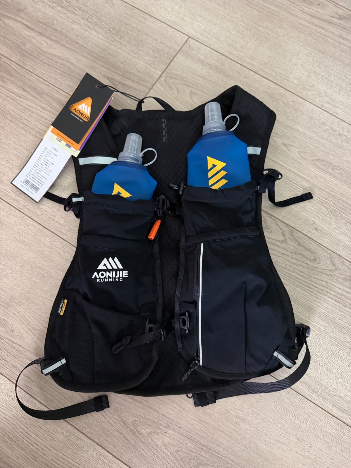 AONIJIE 12L Running Hydration Vest for Men Women 2 Pcs 500ml Soft Flask