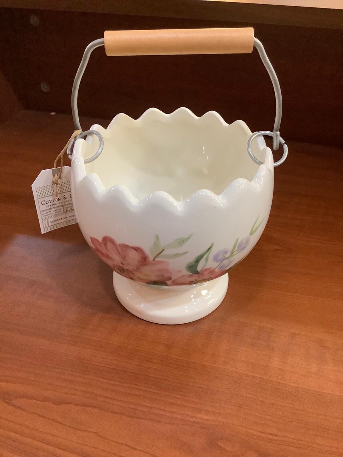MAXCERA COTTON & CO. BASKET PLANTER W/ DARK BROWN BUNNY AND RED FLORAL DESIGN