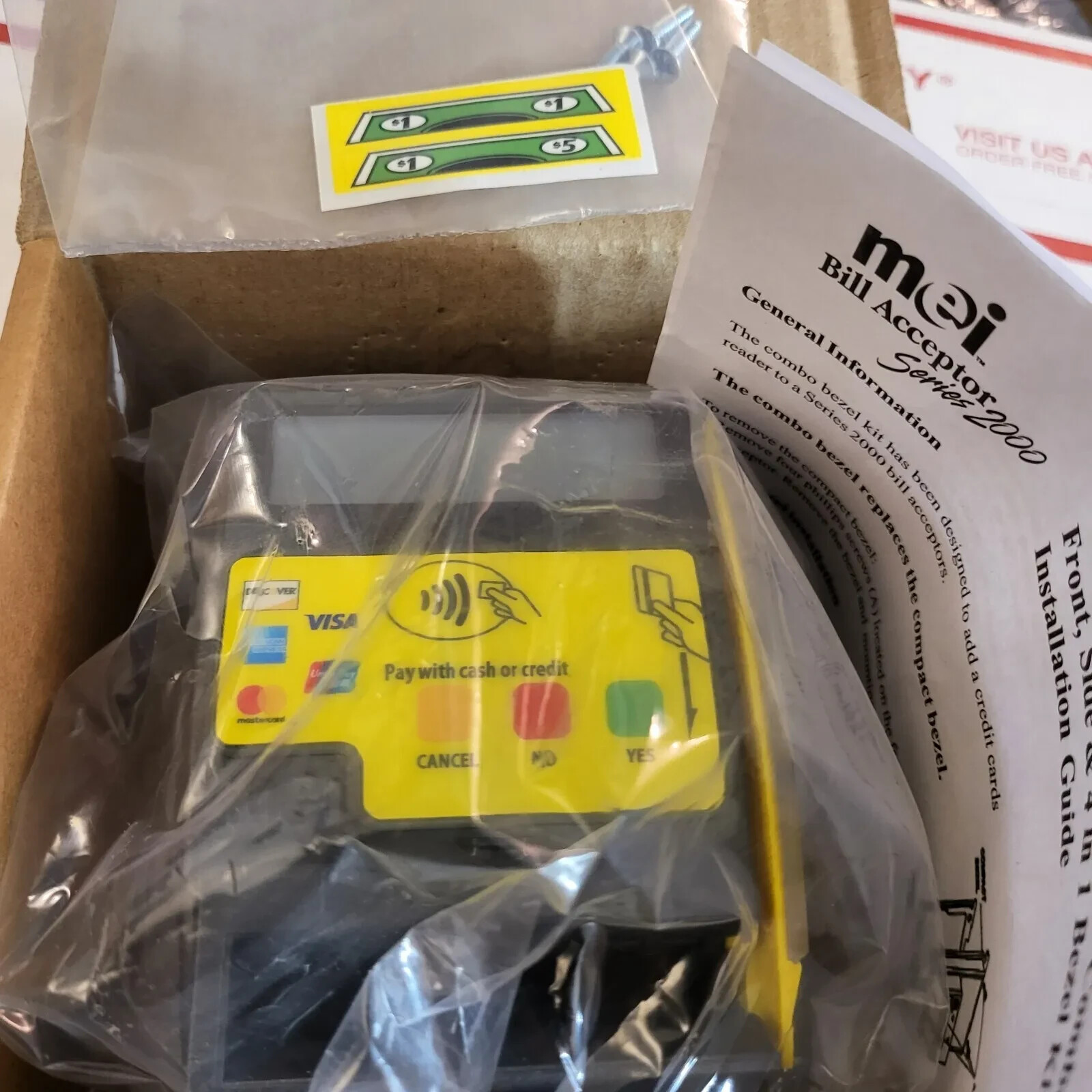 CPI/Mei 4 IN 1 Credit Card Bezel brand new in the box.