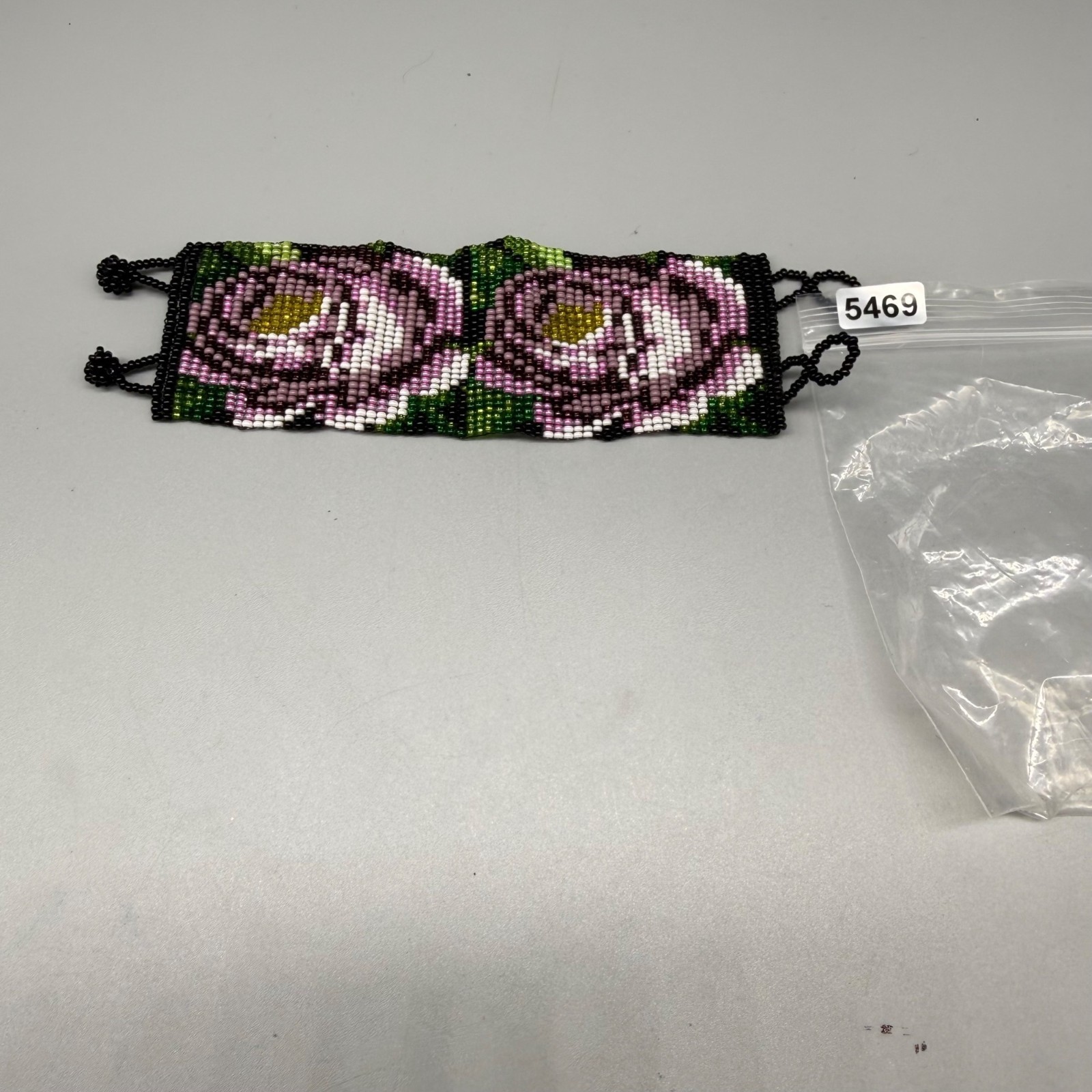 Handcrafted Beaded Bracelet With Purple Floral Design & Adjustable Loop Closures