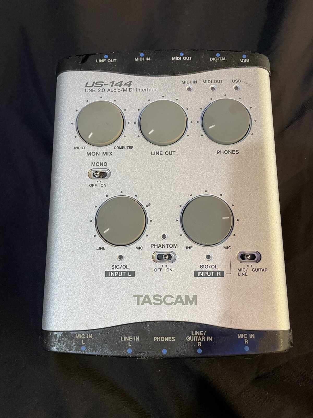 Tascam US-144. USB audio interface. works great.