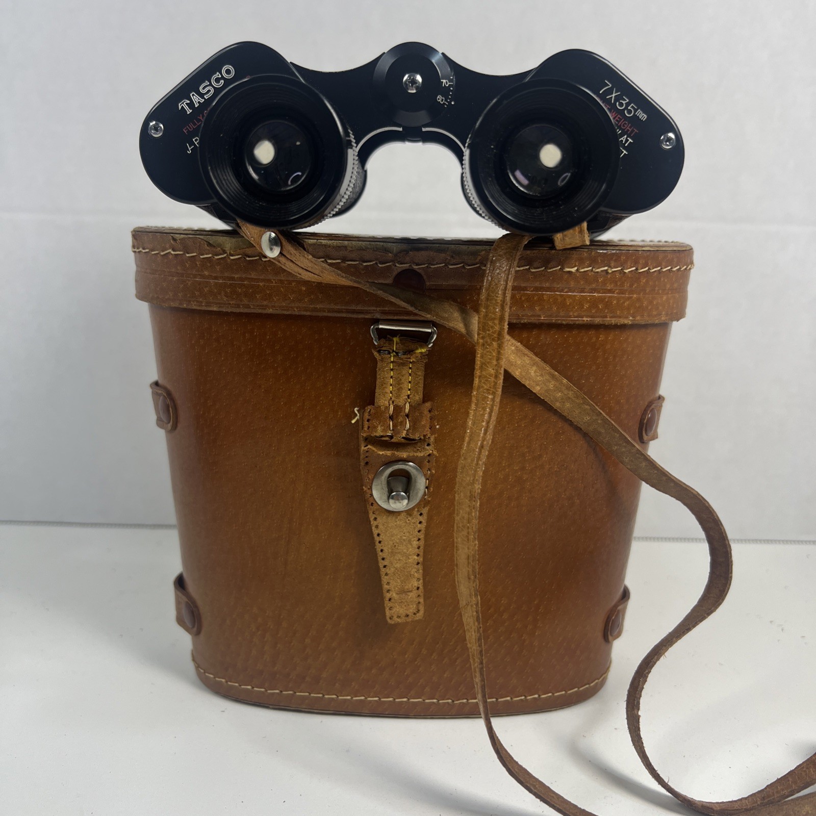 Vintage 50s-60s Tasco binoculars featuring "Fully Coated Optics 7x35 Made In Jap