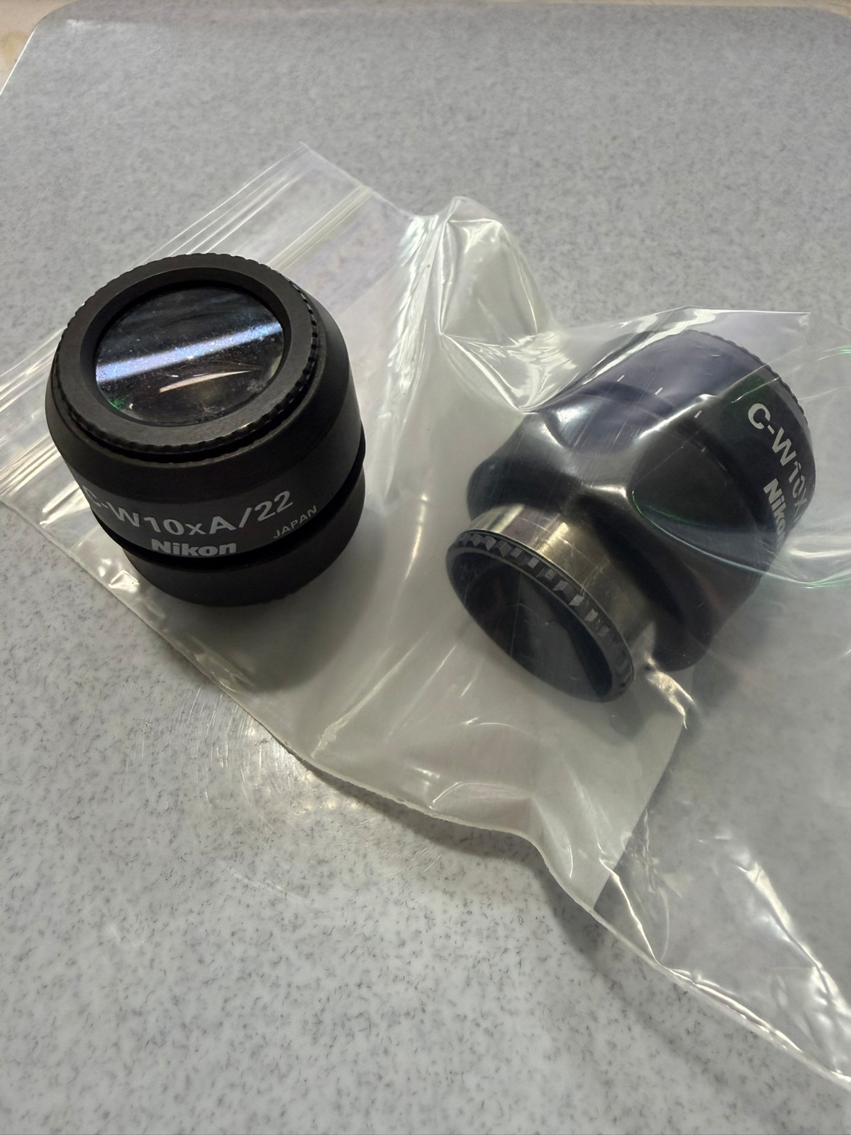 Lot of 2 Nikon C-W10xA/22 10x Wide Field 22mm Microscope Eyepieces Optical Lens