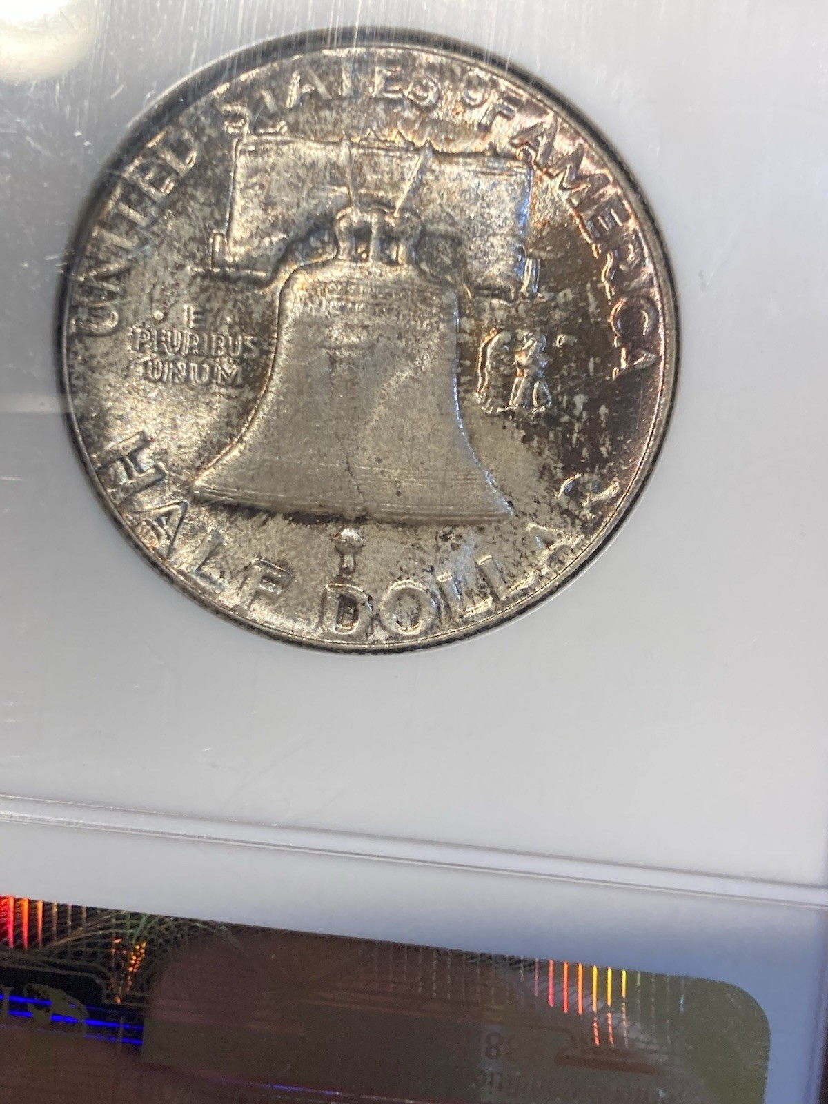 1957 Franklin Half Dollar NGC MS64 CAC Original Toned