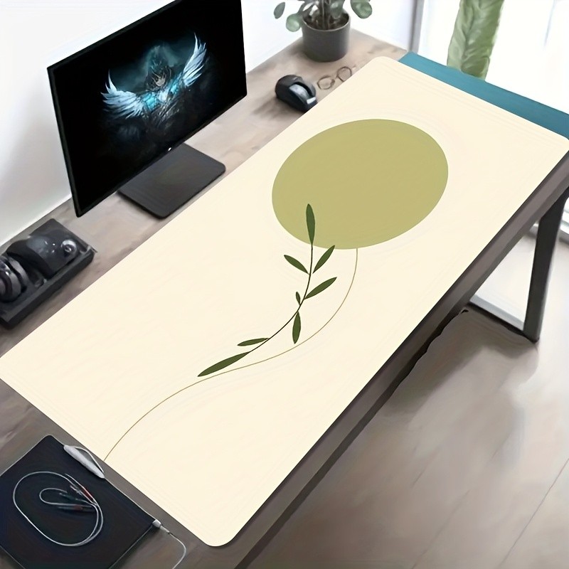 A Large Gaming Mouse Pad Featuring a Minimalist And Fresh Green Leaf Circular D