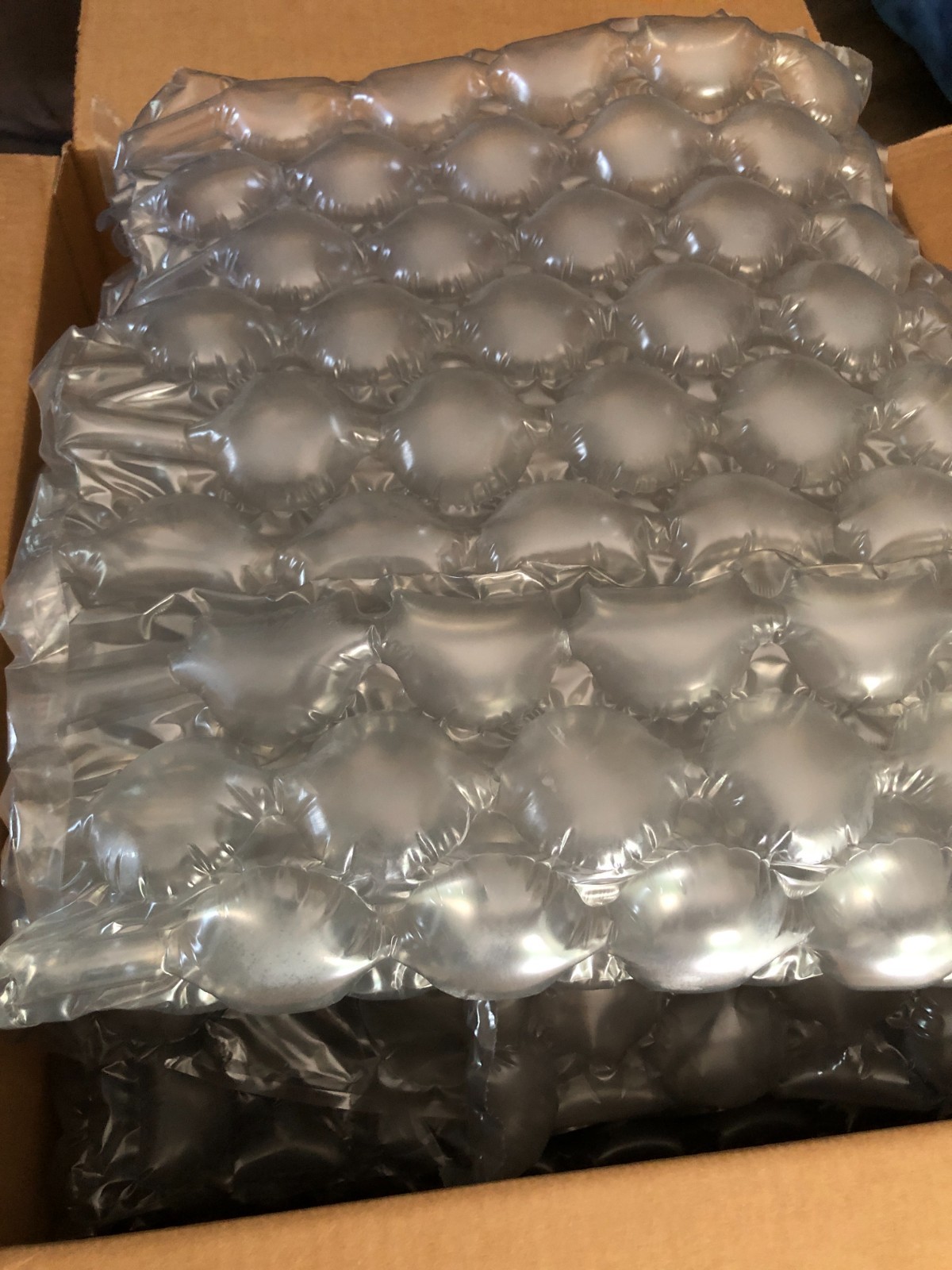 Big bubble Bubble wrap, used in pieces an 18X12 box filled with it