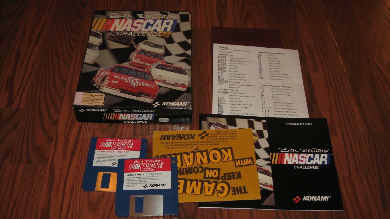 Bill Elliot's Nascar Challenge Commodore Amiga with pictured items. Tested