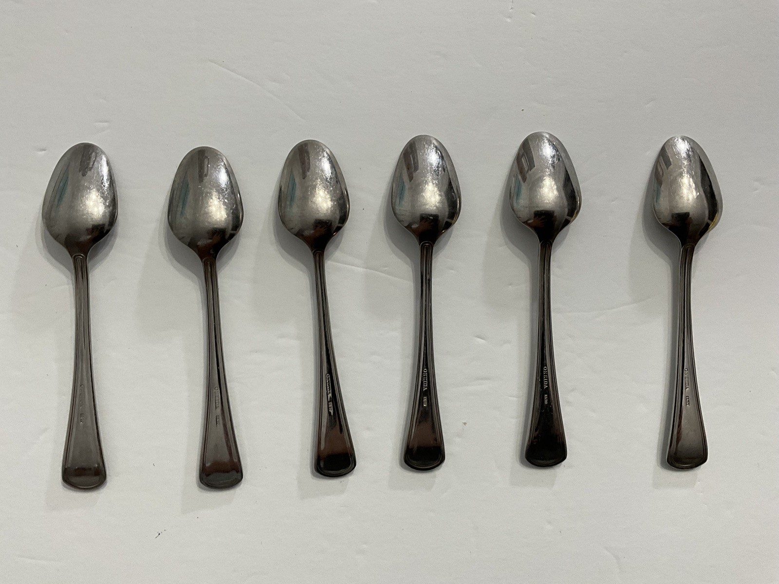 Lot 6 Oneida Dessert Spoon-Used