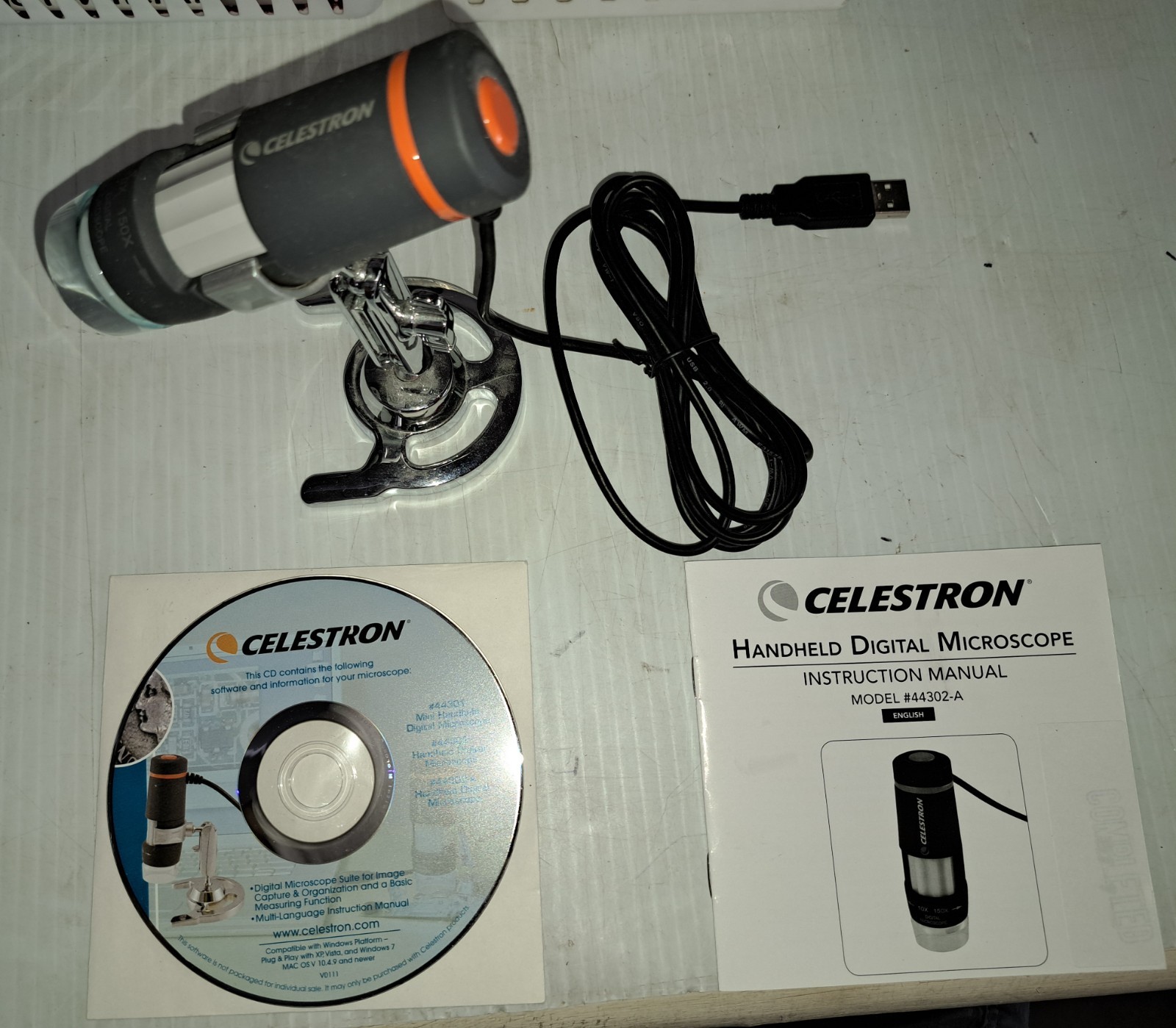 CELESTRON HANDHELD DIGITAL MICROSCOPE - CD-ROM, STAND, PRINTED MANUAL - NEAR-NEW