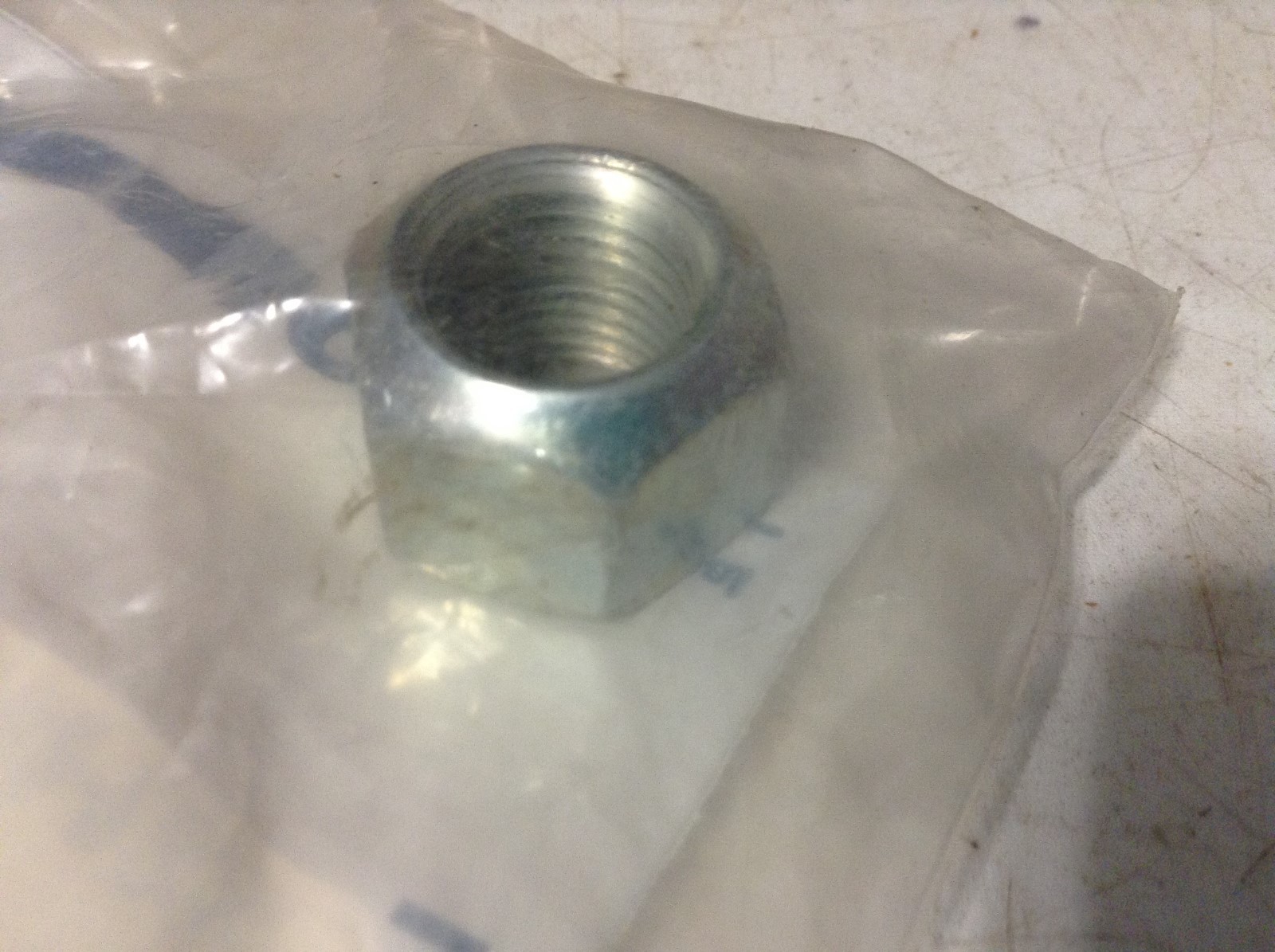 483879R2 - A New Lug Nut For A CaseIH 385, 395, 485, 495, 585, 595 Tractors.