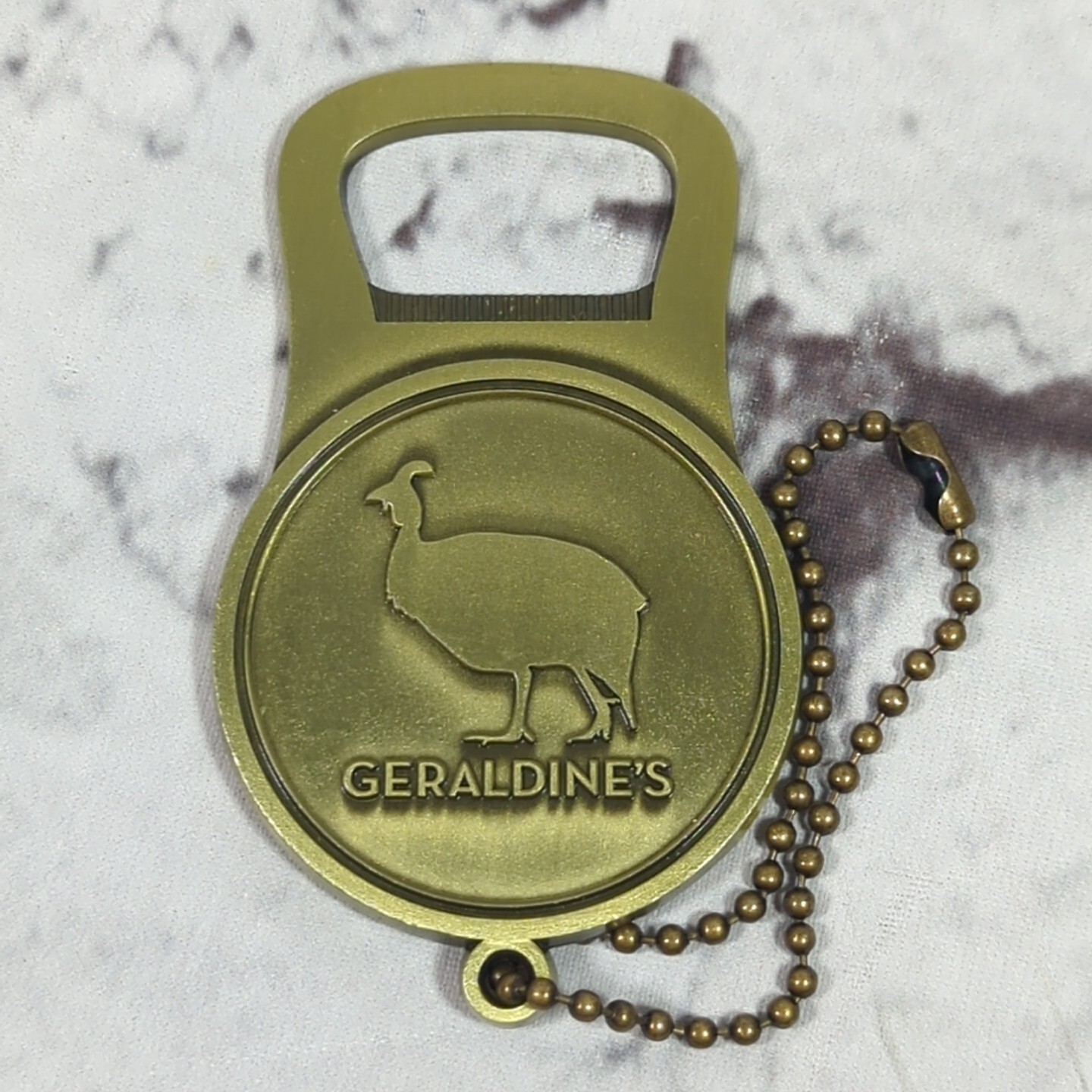 Geraldines Advertising Bottle Opener Keychain