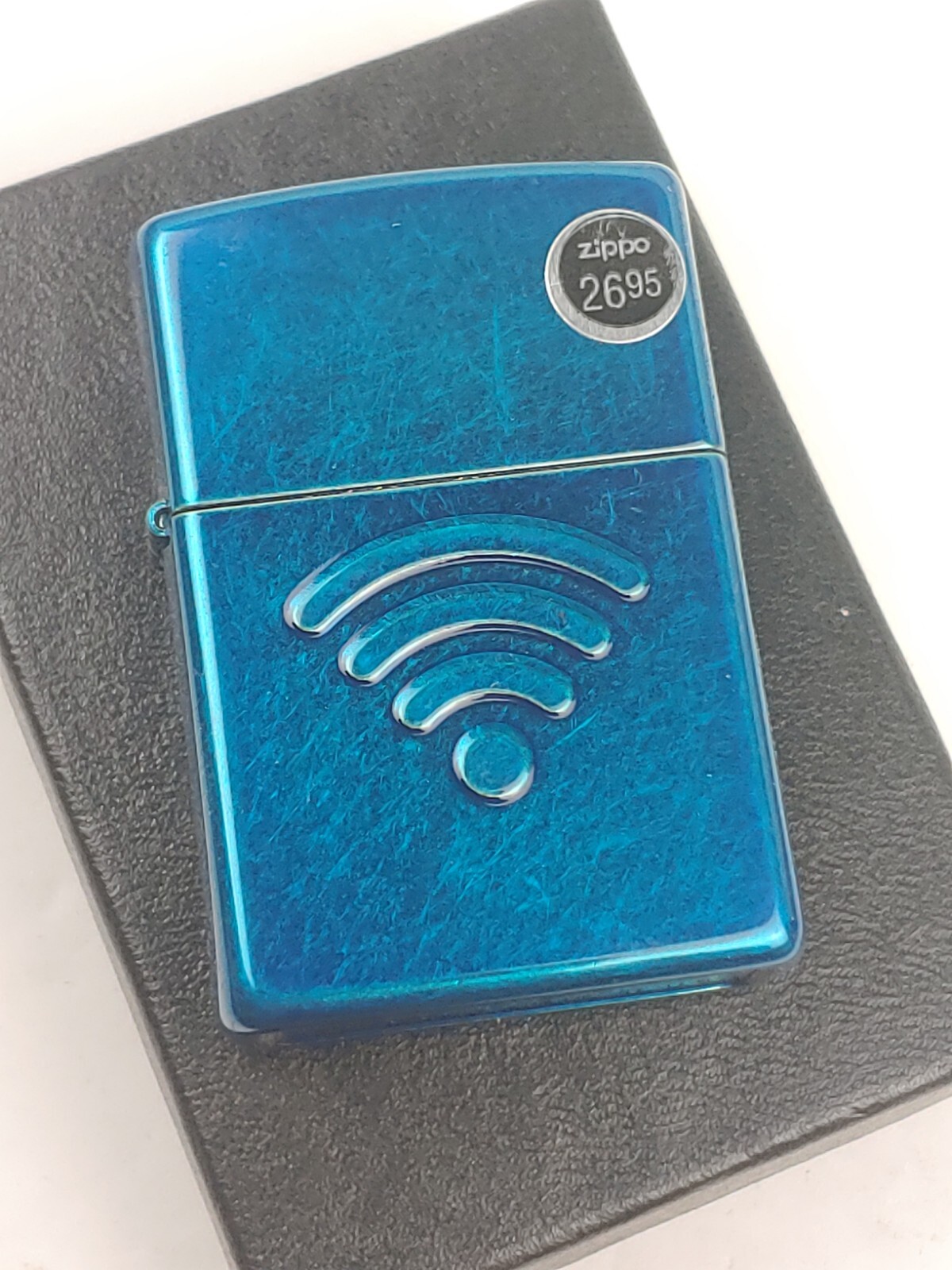 Zippo 29716 WiFi Embossed Symbol on High Polished Blue Lighter - APR (D) 2018