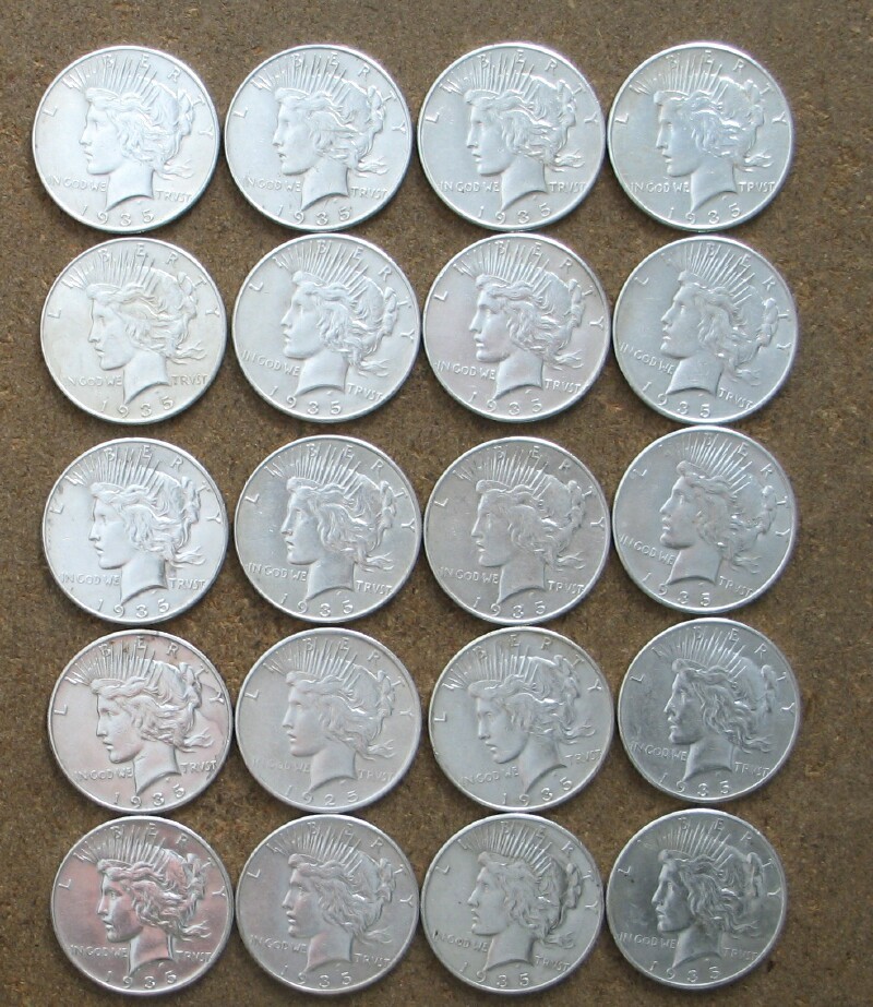 ROLL 1935-P  PEACE SILVER DOLLARS..  AU/BU    (UP TO 5 ROLLS AVAILABLE)