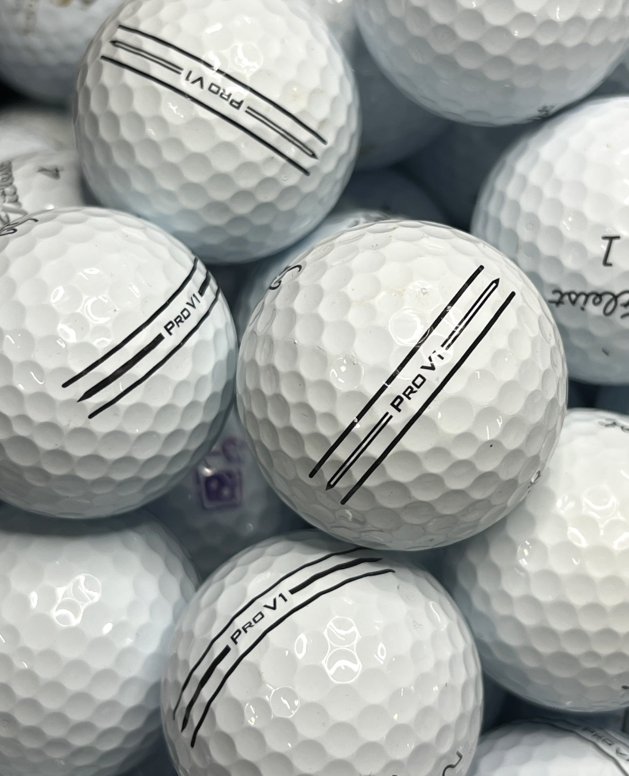 24 Near Mint AAAA Titleist Pro V1 Used Golf Balls with Enhanced Alignment Lines