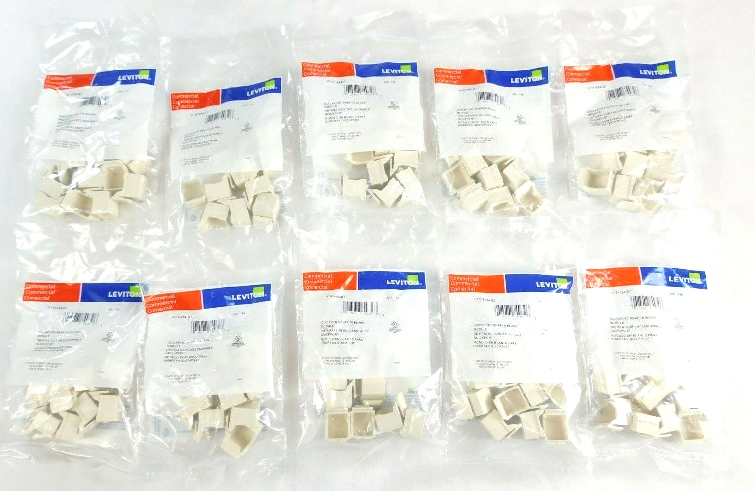 41084-BT Leviton Blank QuickPort Insert, Light Almond - 100 COUNT