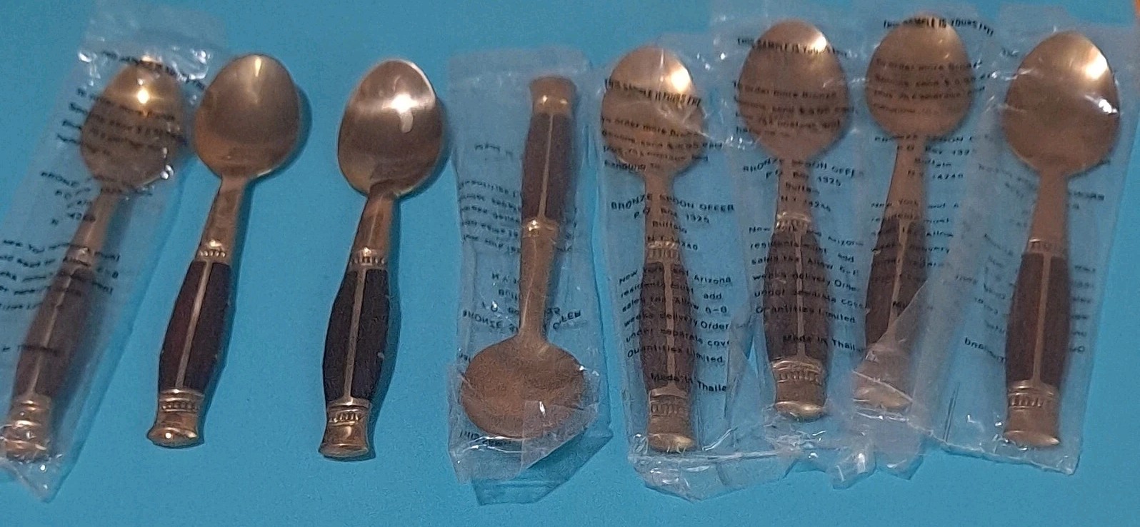 Set Of 8 Bronze Spoons From Thailand  4.5" B35