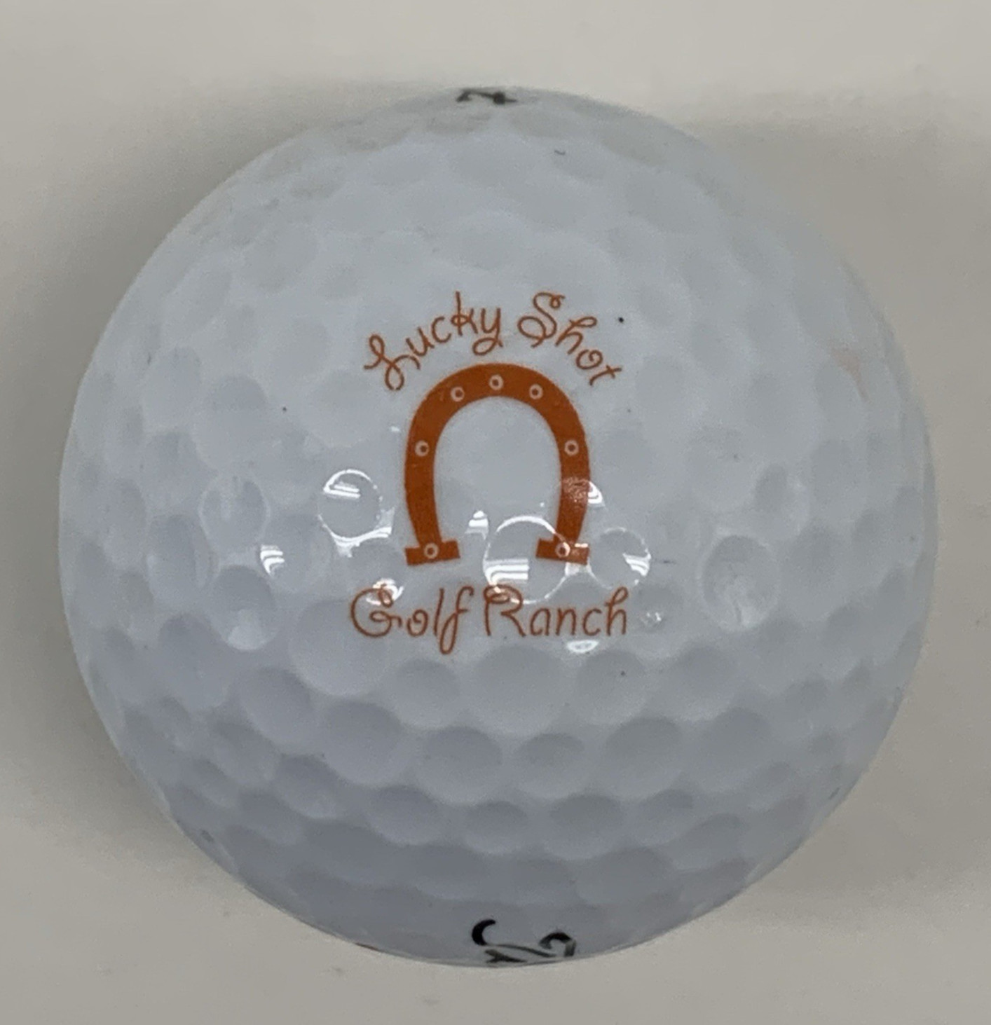 Lucky Shot Golf Ranch Golf Ball Titleist Orange Horseshoe Logo Souvenir