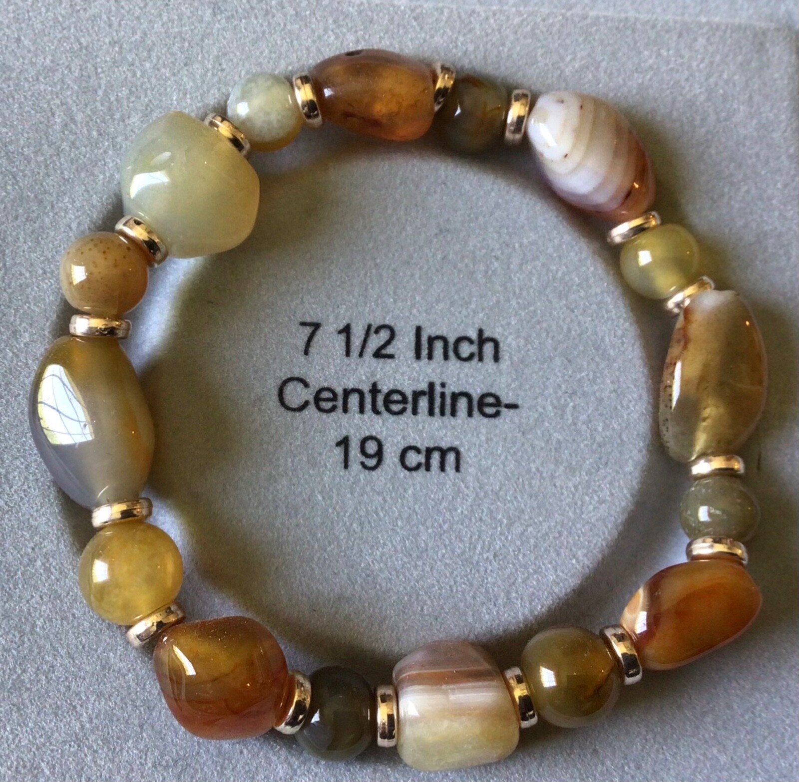 7.5" bracelet, multicolored beads with gold accent. made in the USA