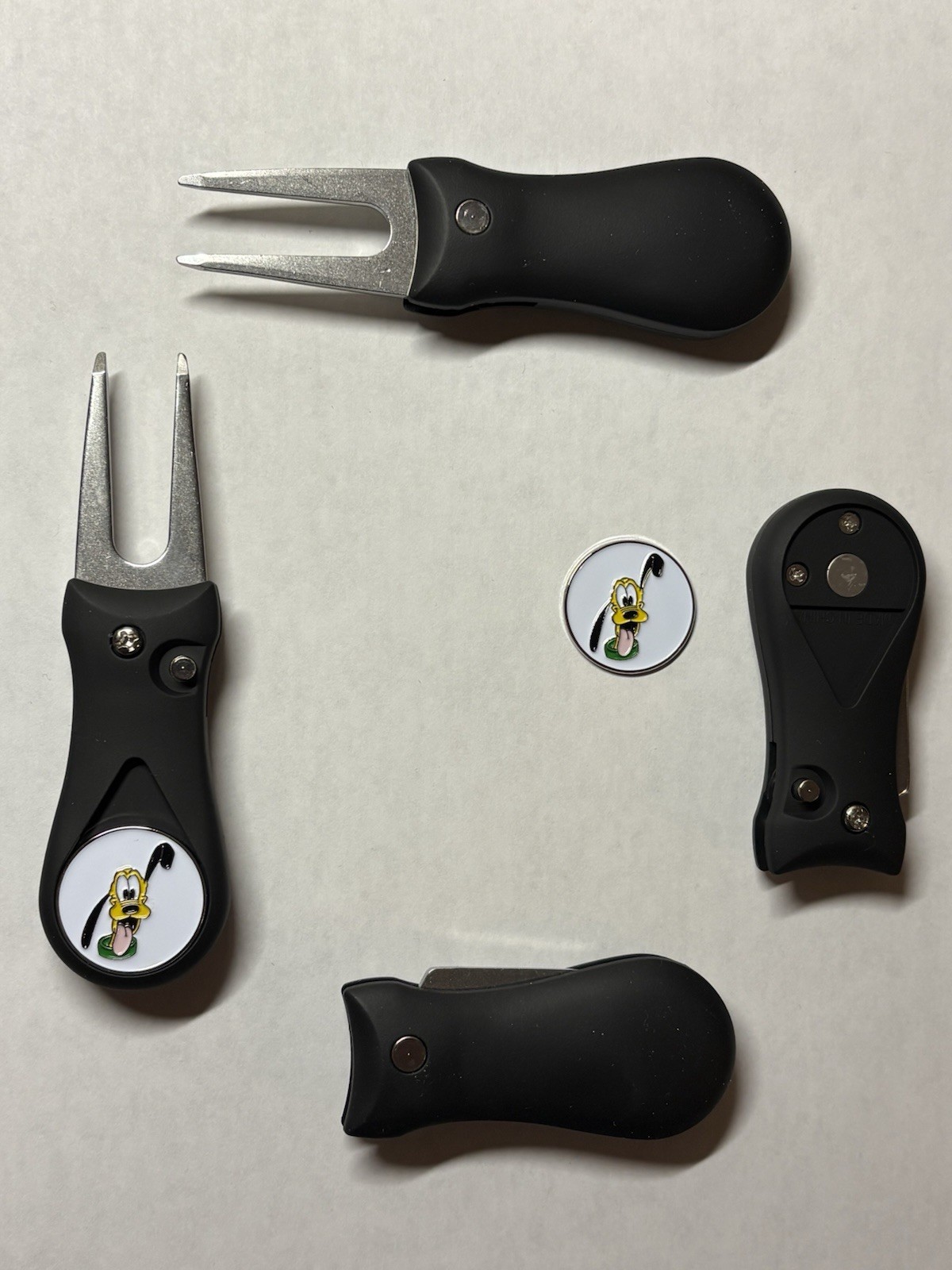 (1)  Switchblade Golf Divot Tool & (1) Pluto Disney 1" Coin Style Golf Marker
