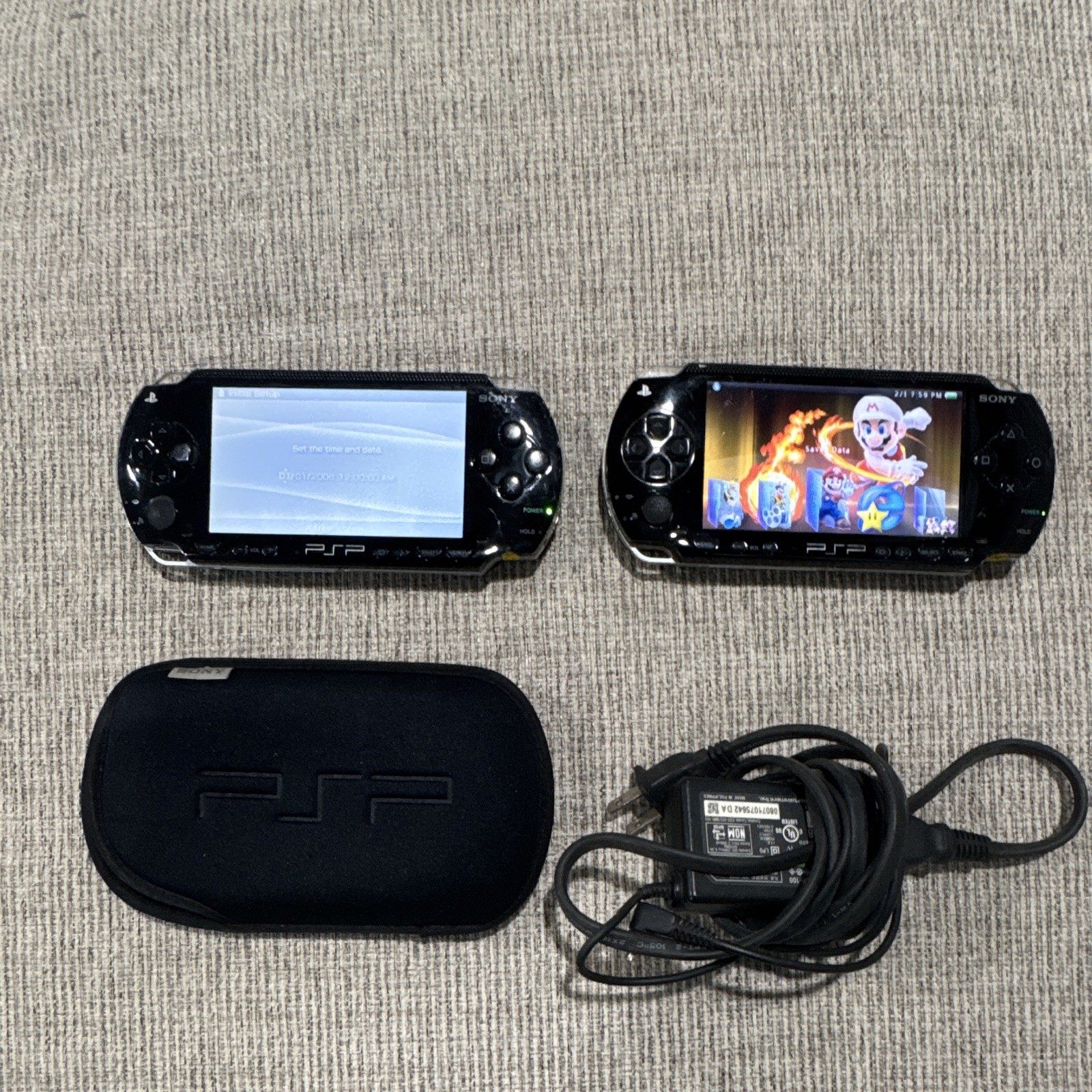 Sony PSP /2 of them with charger and 8gb jailbreak crazy amount of games!!